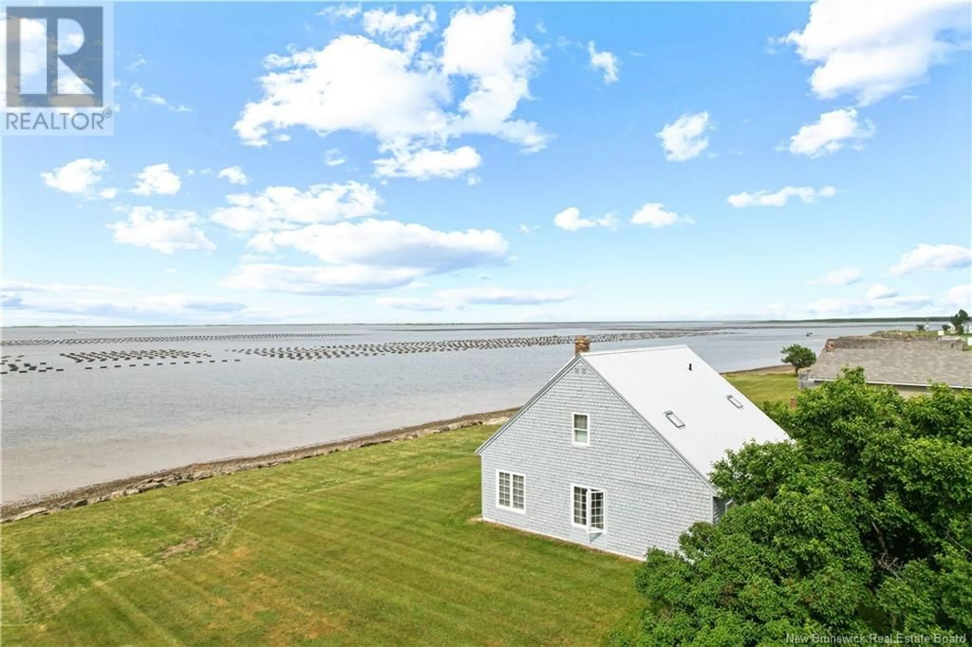 A pic from outside/outdoor area/front of a property/back of a property/a pic from drone, water/lake/river/ocean view for 59 POWELL DRIVE, Jardineville New Brunswick E4W1T8