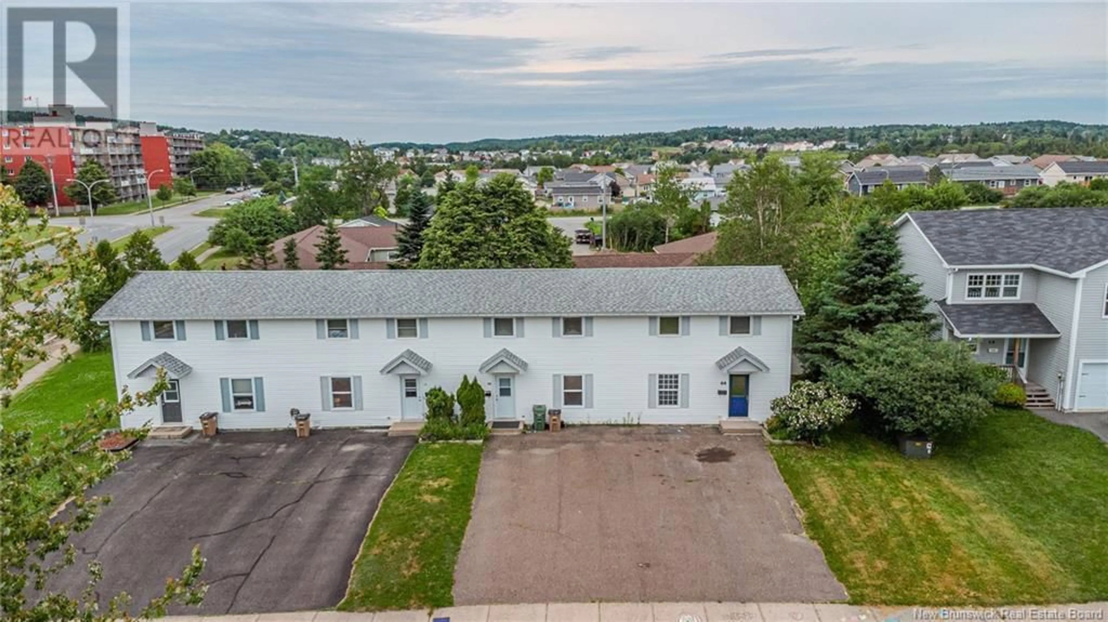 A pic from outside/outdoor area/front of a property/back of a property/a pic from drone, street for 64 OAKHILL CRESCENT, Saint John New Brunswick E2J4M4