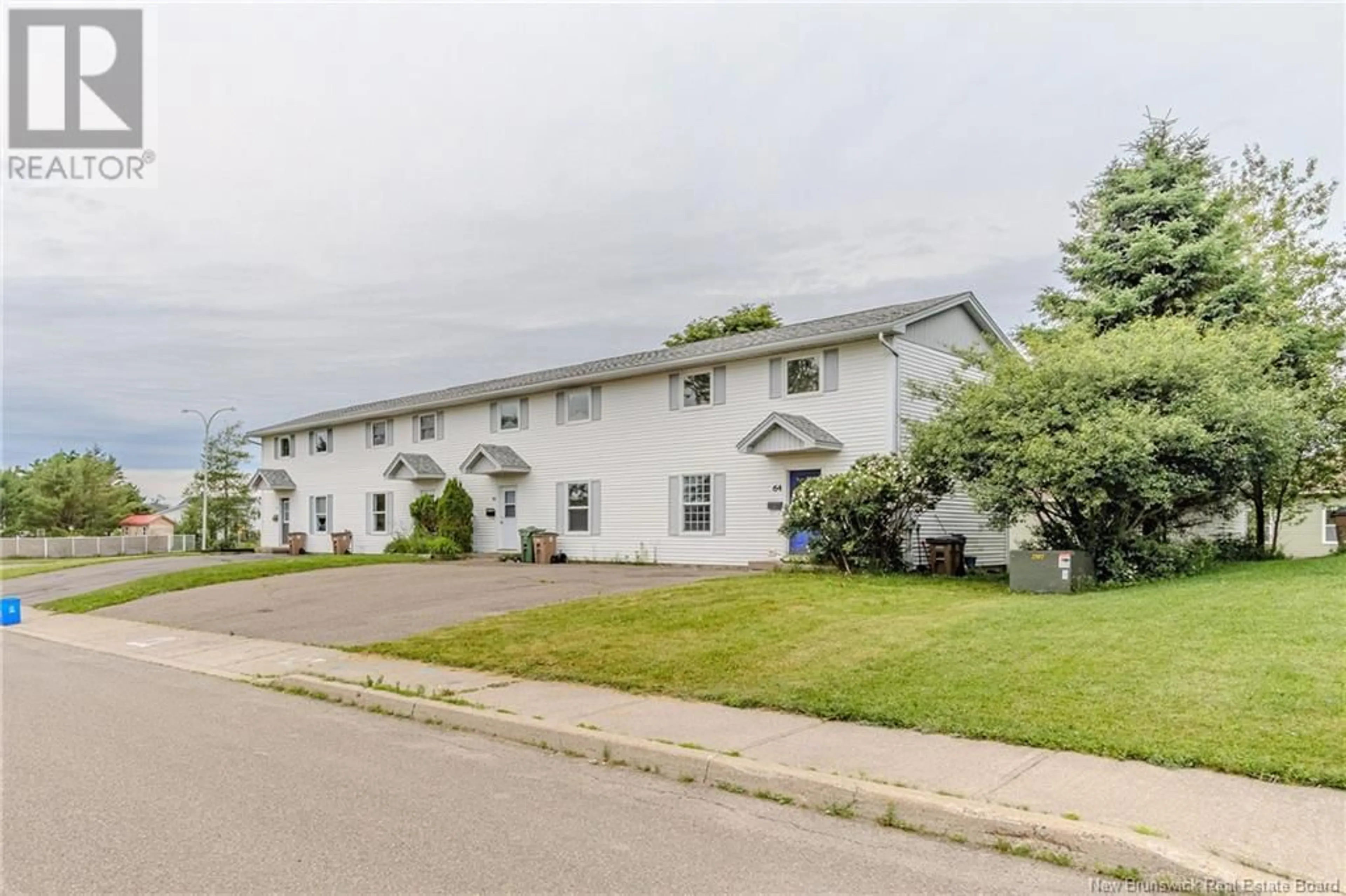 A pic from outside/outdoor area/front of a property/back of a property/a pic from drone, street for 64 OAKHILL CRESCENT, Saint John New Brunswick E2J4M4