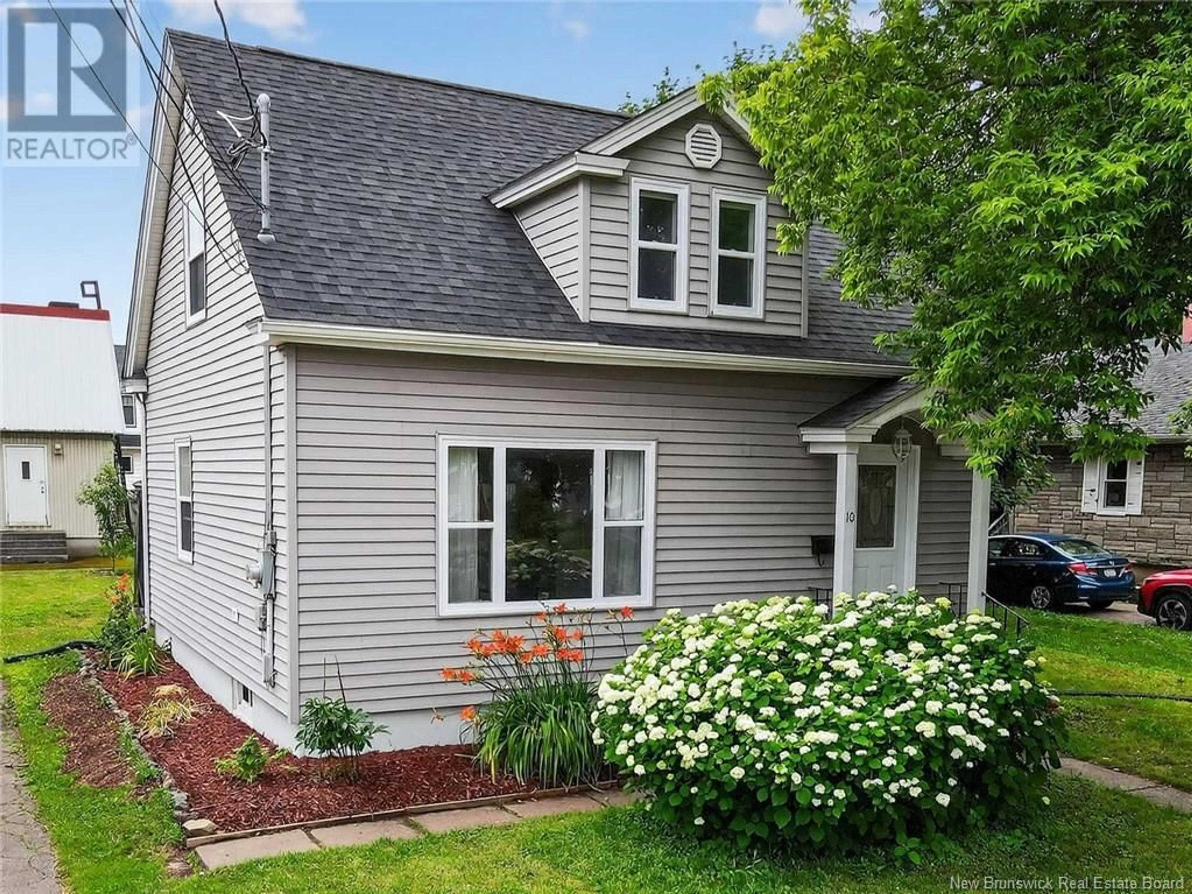 Home with vinyl exterior material, street for 10 EDGETT AVENUE, Moncton New Brunswick E1C7B1