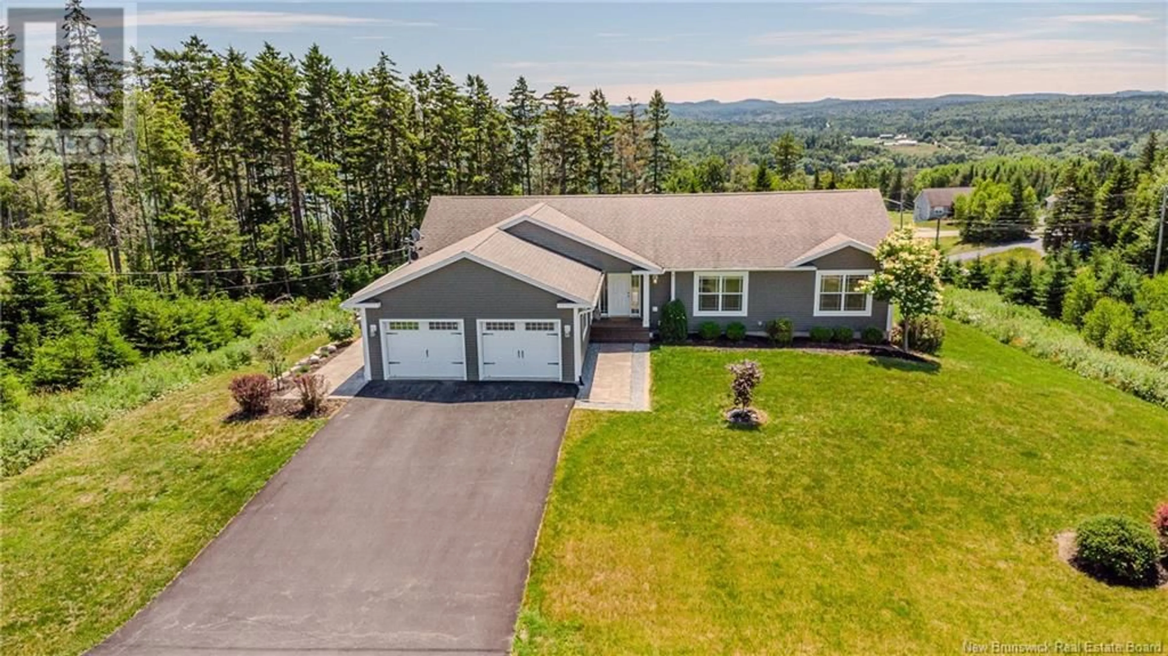 A pic from outside/outdoor area/front of a property/back of a property/a pic from drone, unknown for 4 SUMAC, Quispamsis New Brunswick E2G0H2