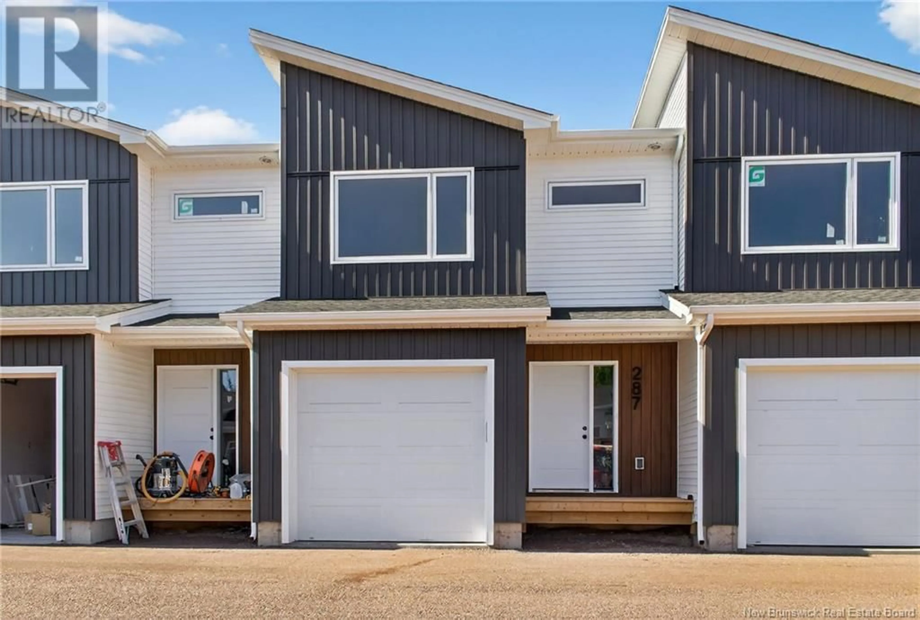 Home with vinyl exterior material, street for 287 ELSLIGER STREET, Dieppe New Brunswick E1H2B9