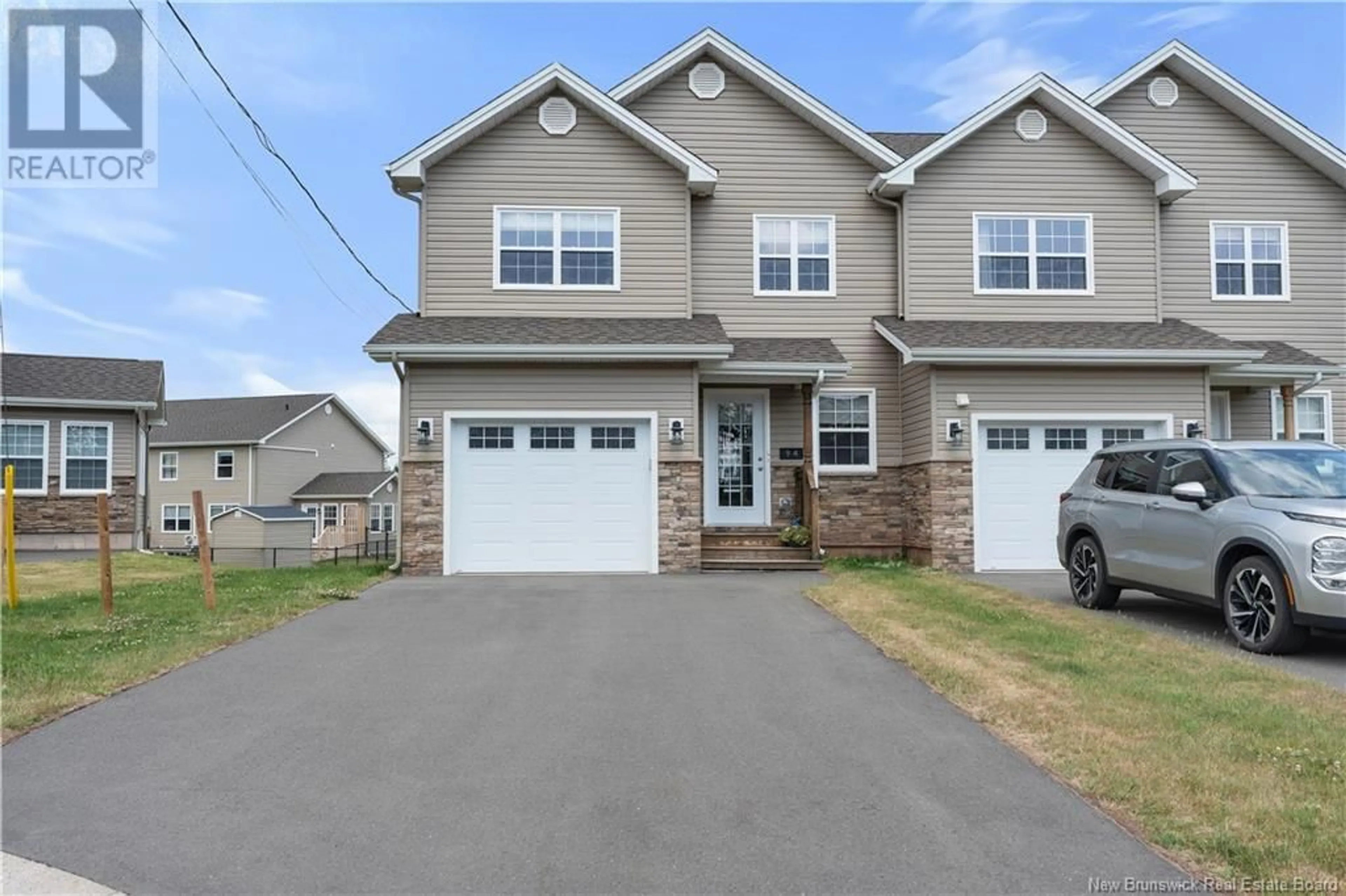 Home with vinyl exterior material, street for 94 BASTARACHE STREET, Dieppe New Brunswick E1A6X9