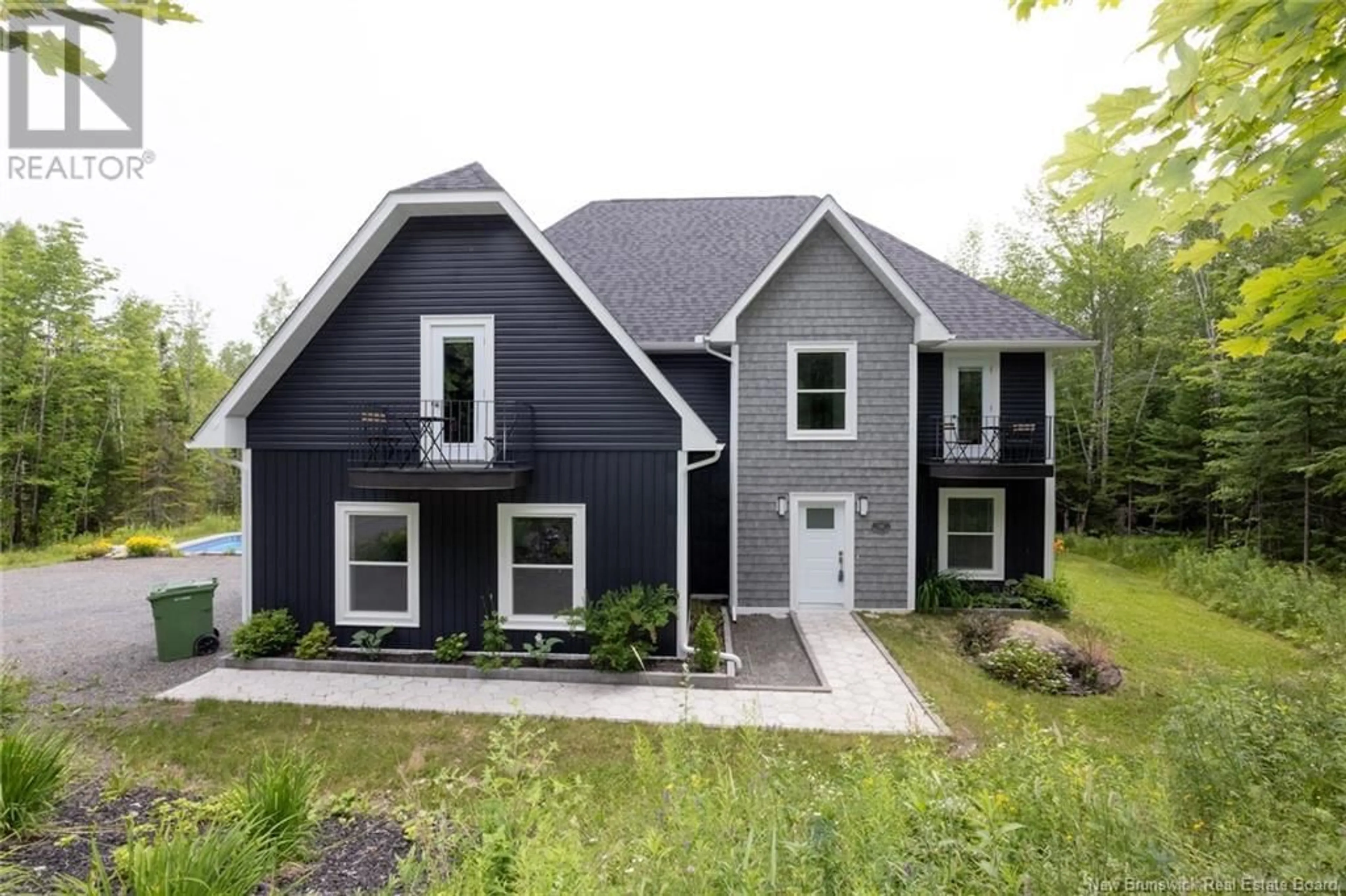 Home with vinyl exterior material, street for 636 DEERWOOD DRIVE, Hanwell New Brunswick E3C1C5
