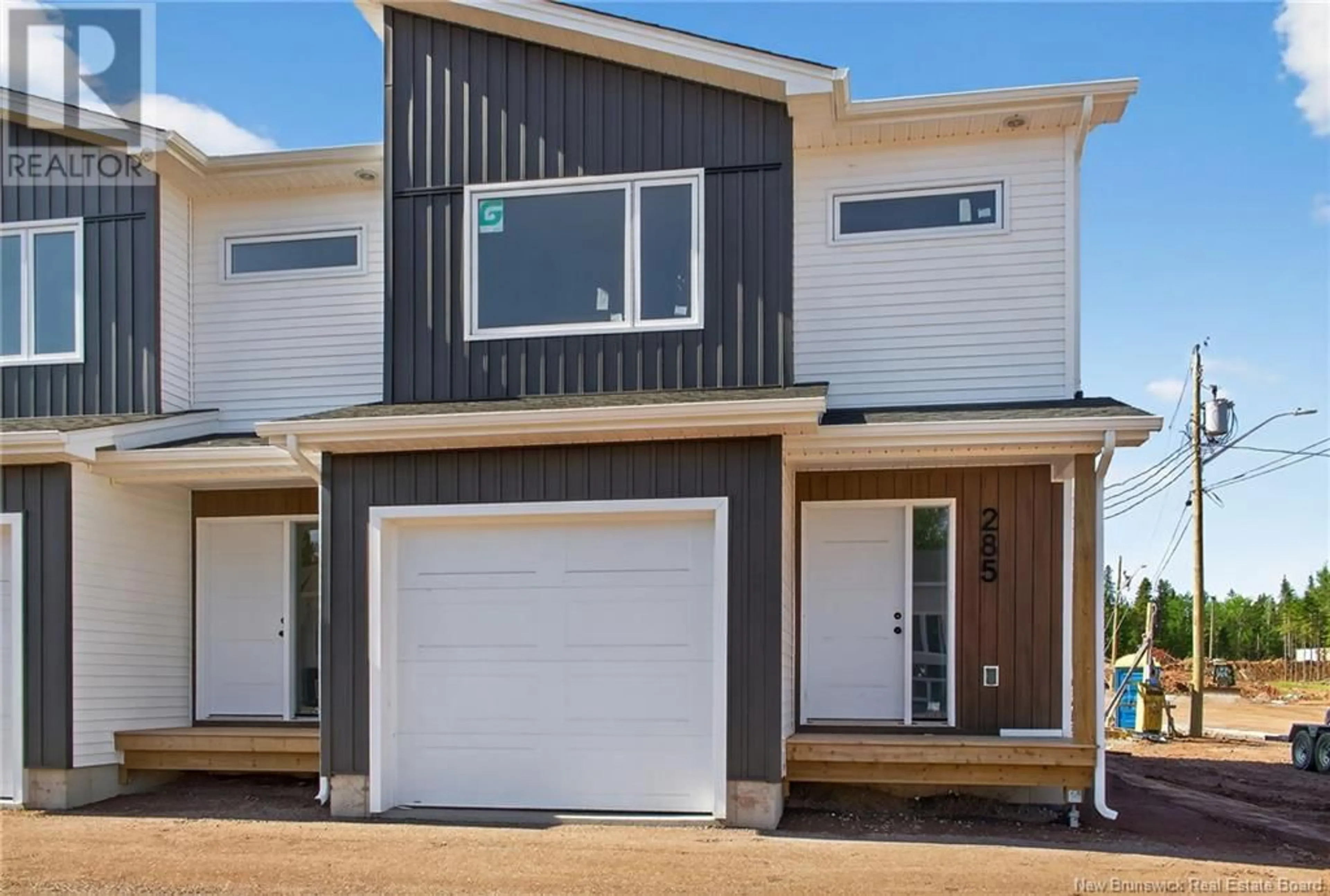 Home with vinyl exterior material, street for 285 ELSLIGER STREET, Dieppe New Brunswick E1H2B9