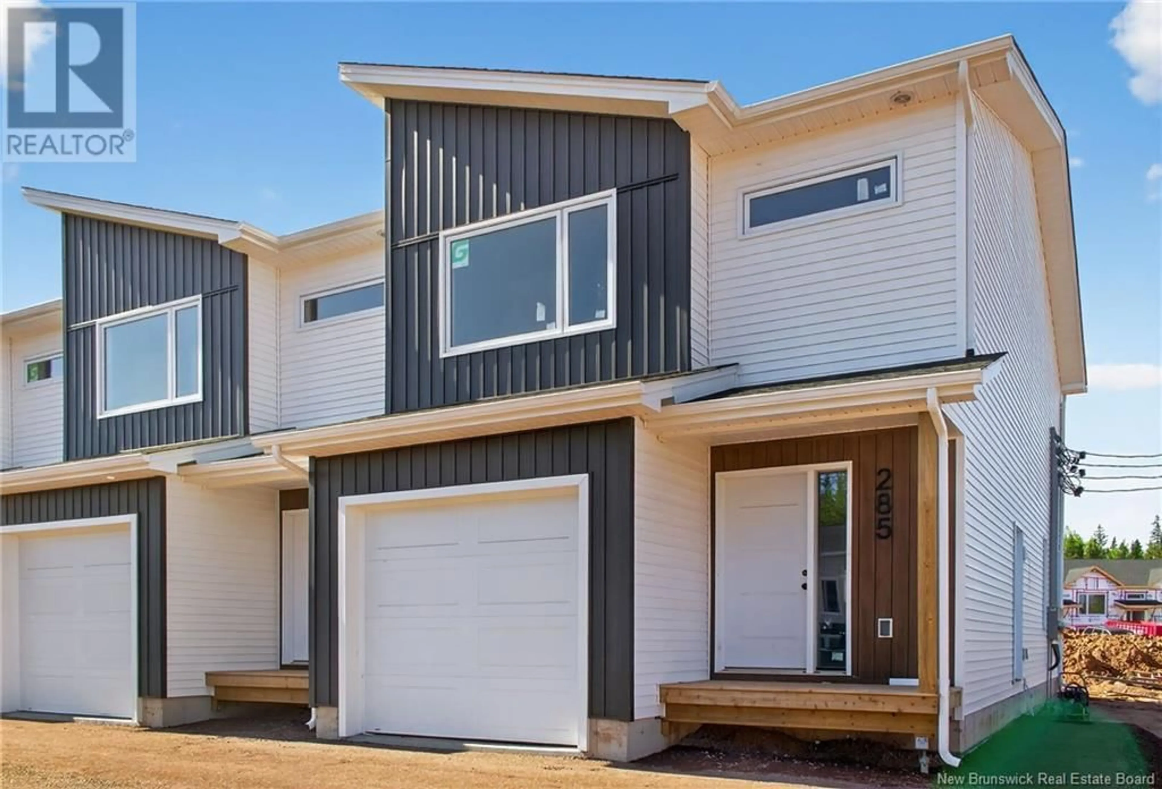 Home with vinyl exterior material, street for 285 ELSLIGER STREET, Dieppe New Brunswick E1H2B9