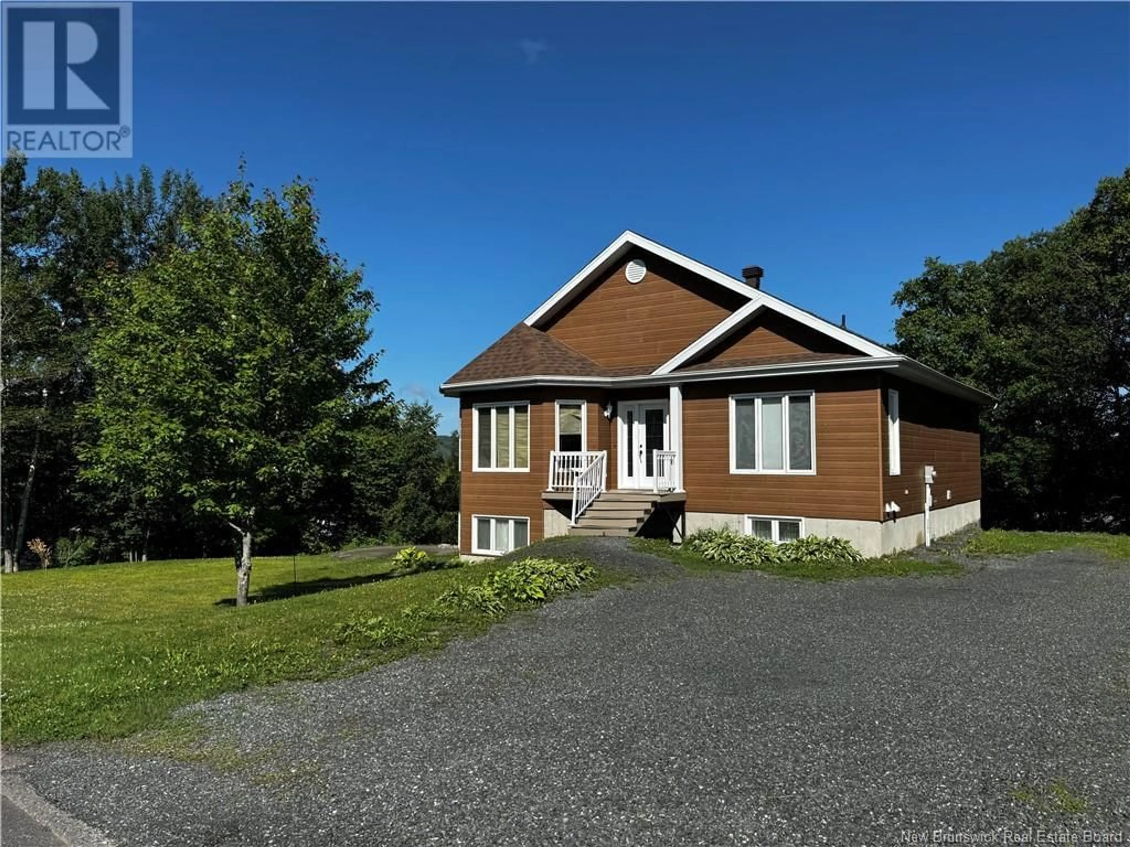 A pic from outside/outdoor area/front of a property/back of a property/a pic from drone, unknown for 86 DES ORMES AVENUE, Edmundston New Brunswick E3V4J9