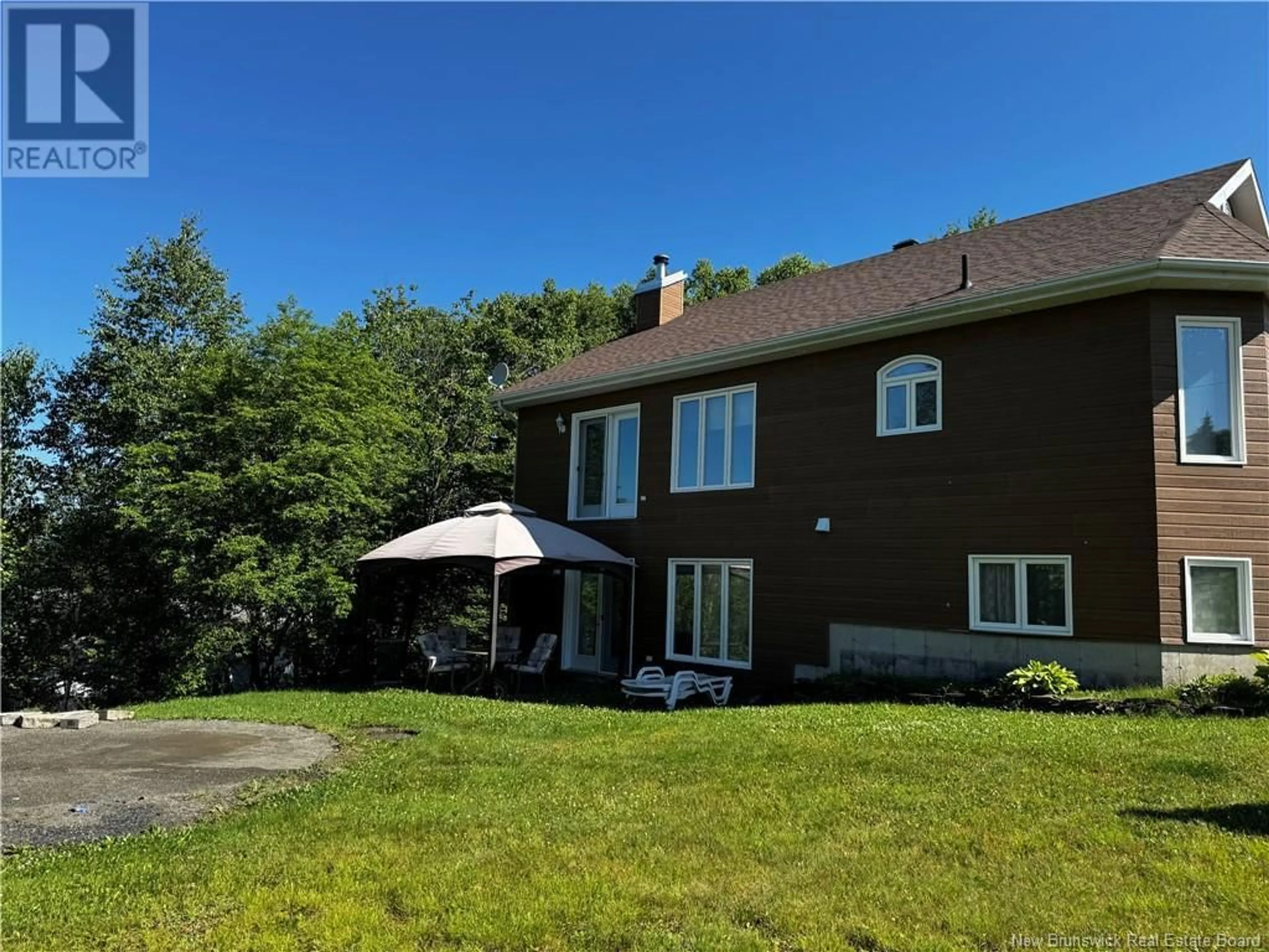 A pic from outside/outdoor area/front of a property/back of a property/a pic from drone, unknown for 86 DES ORMES AVENUE, Edmundston New Brunswick E3V4J9
