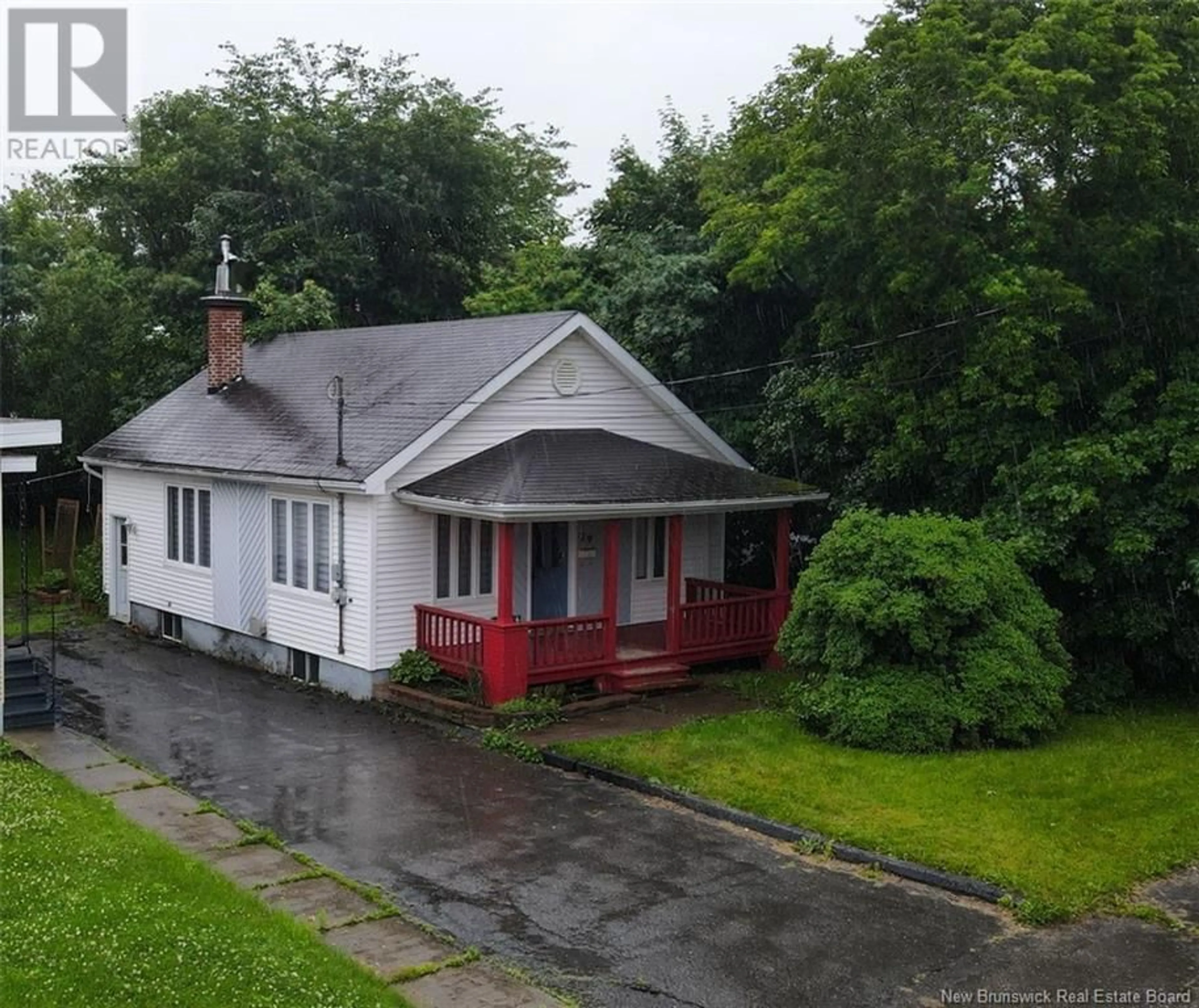 A pic from outside/outdoor area/front of a property/back of a property/a pic from drone, street for 29 ST-JEAN AVENUE, Edmundston New Brunswick E3V1C7