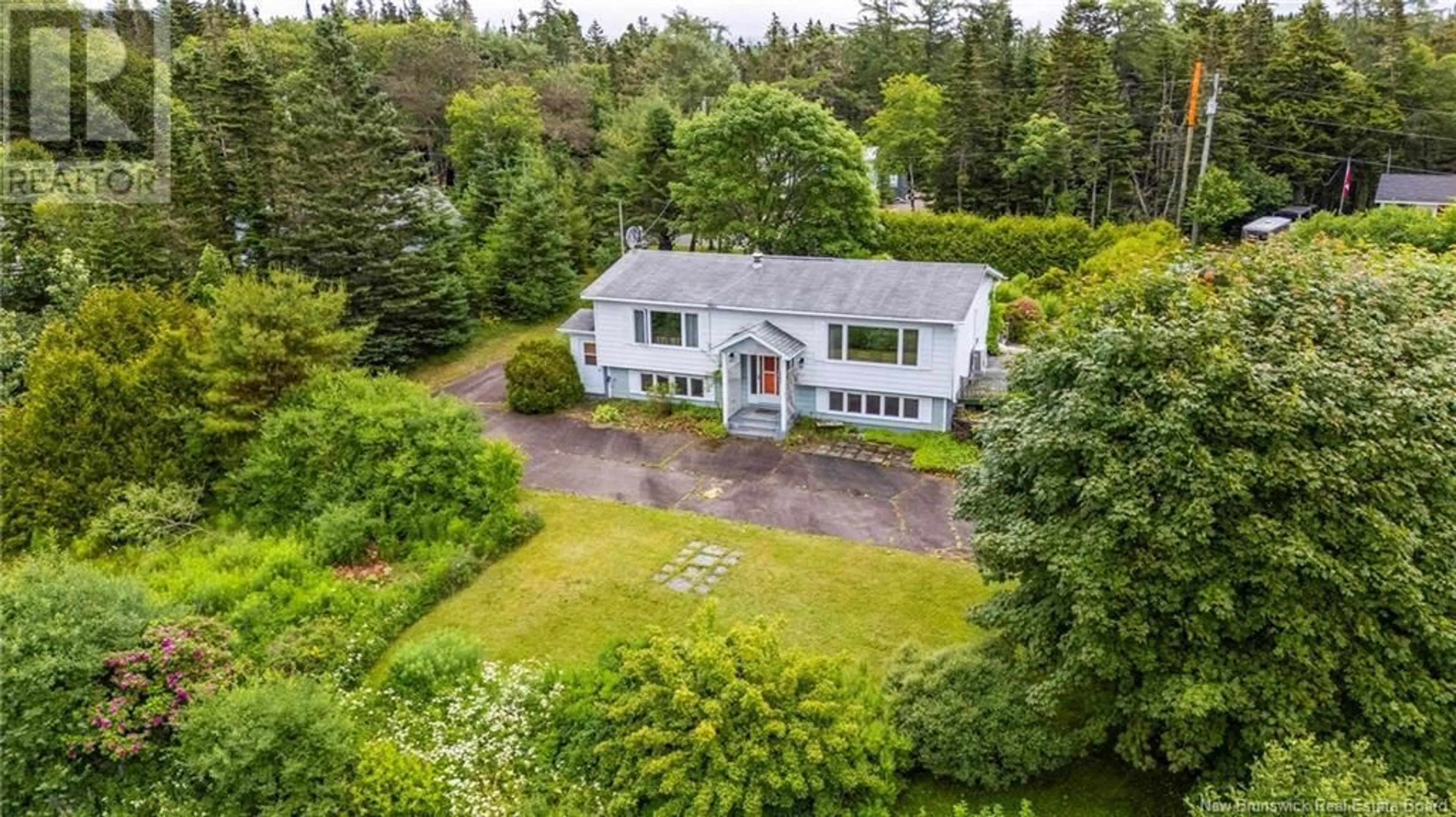A pic from outside/outdoor area/front of a property/back of a property/a pic from drone, street for 22 CARRYING COVE, New River Beach New Brunswick E5J1J4