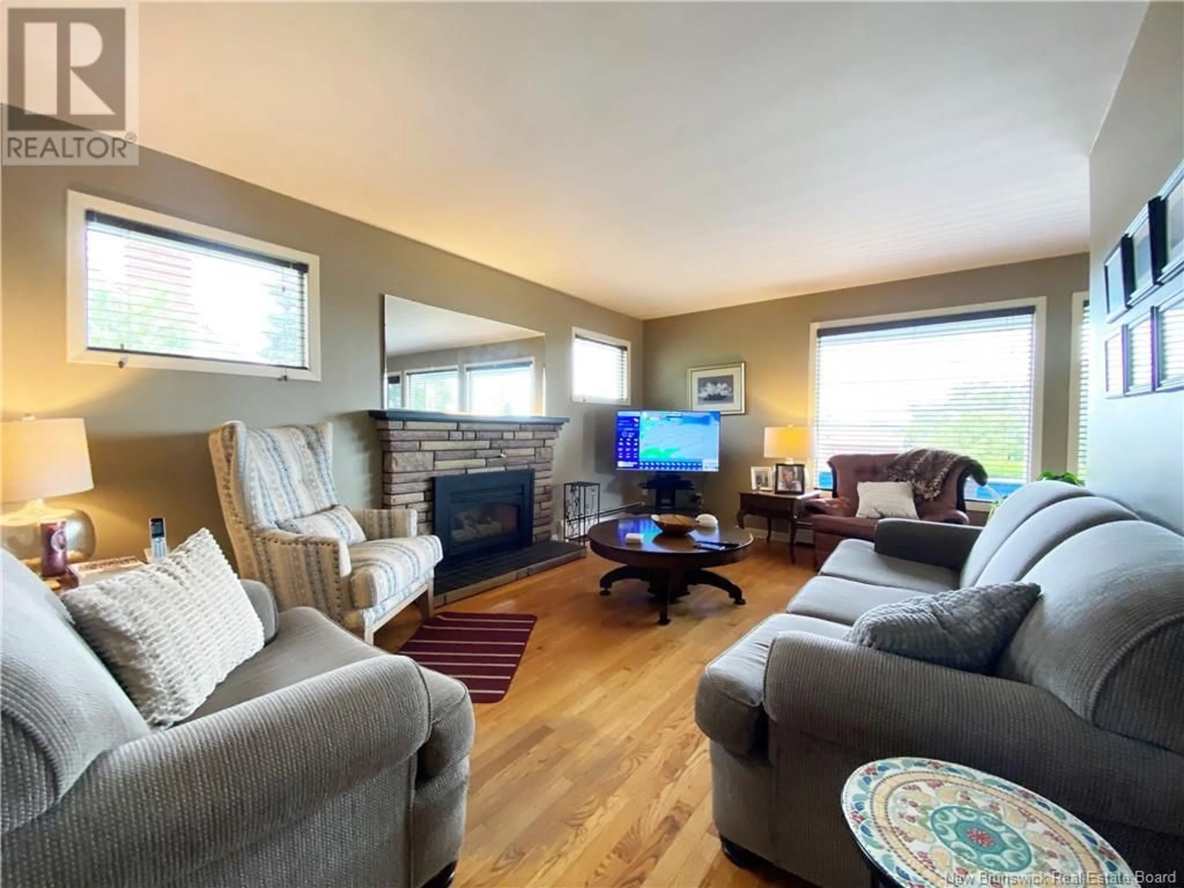 Living room with furniture, wood/laminate floor for 154 LAKESIDE DRIVE, Riverview New Brunswick E1B3G9