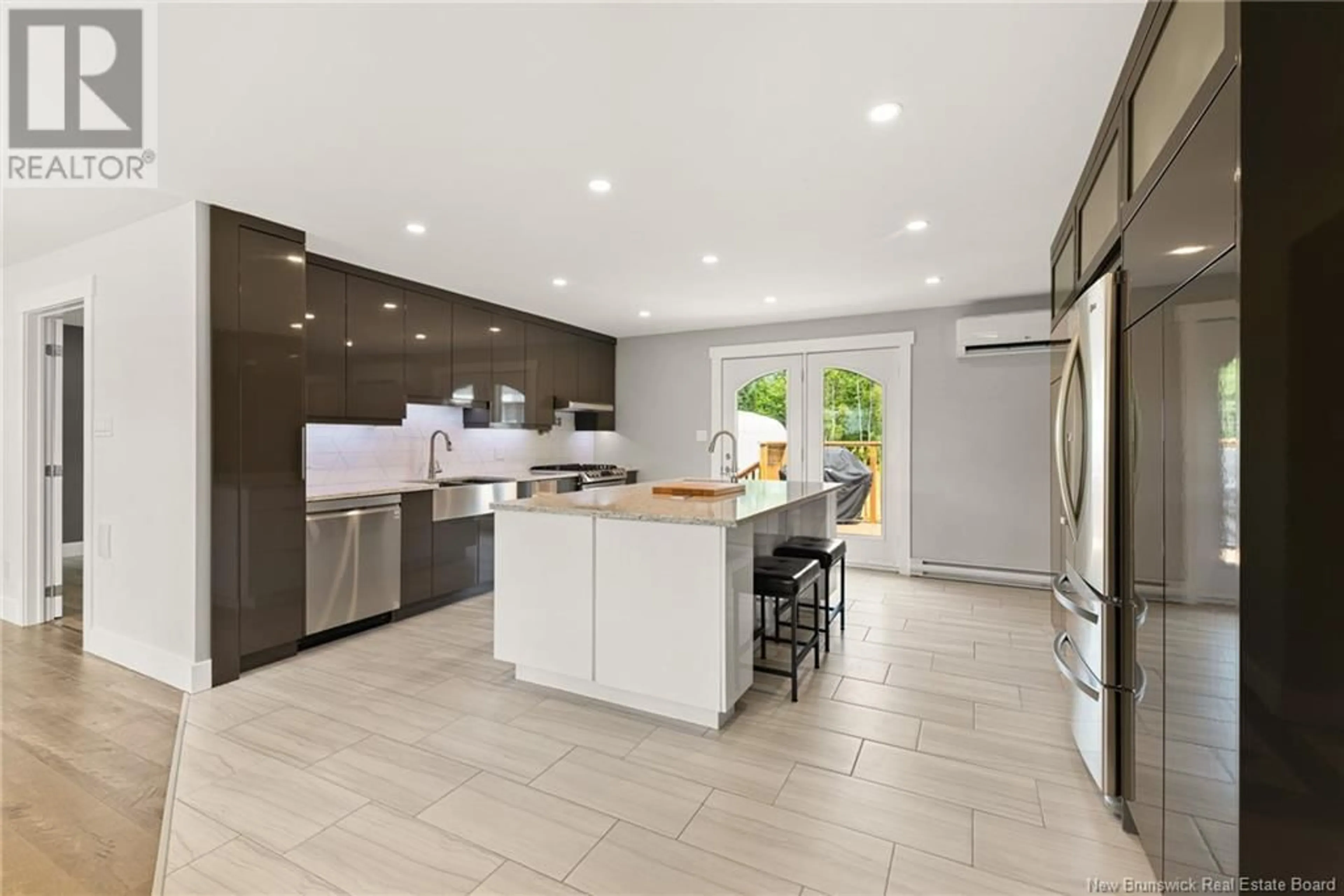 Open concept kitchen, ceramic/tile floor for 38 SCOUDOUC RIVER ROAD, Scoudouc New Brunswick E4P3T1