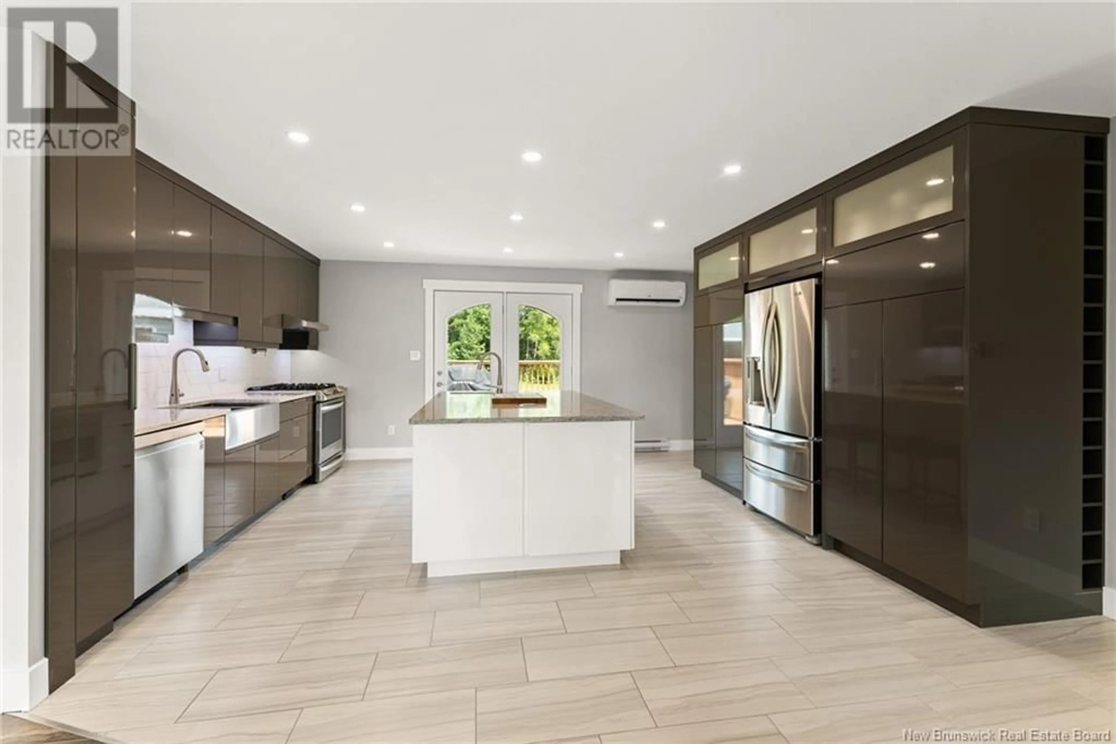 Open concept kitchen, ceramic/tile floor for 38 SCOUDOUC RIVER ROAD, Scoudouc New Brunswick E4P3T1
