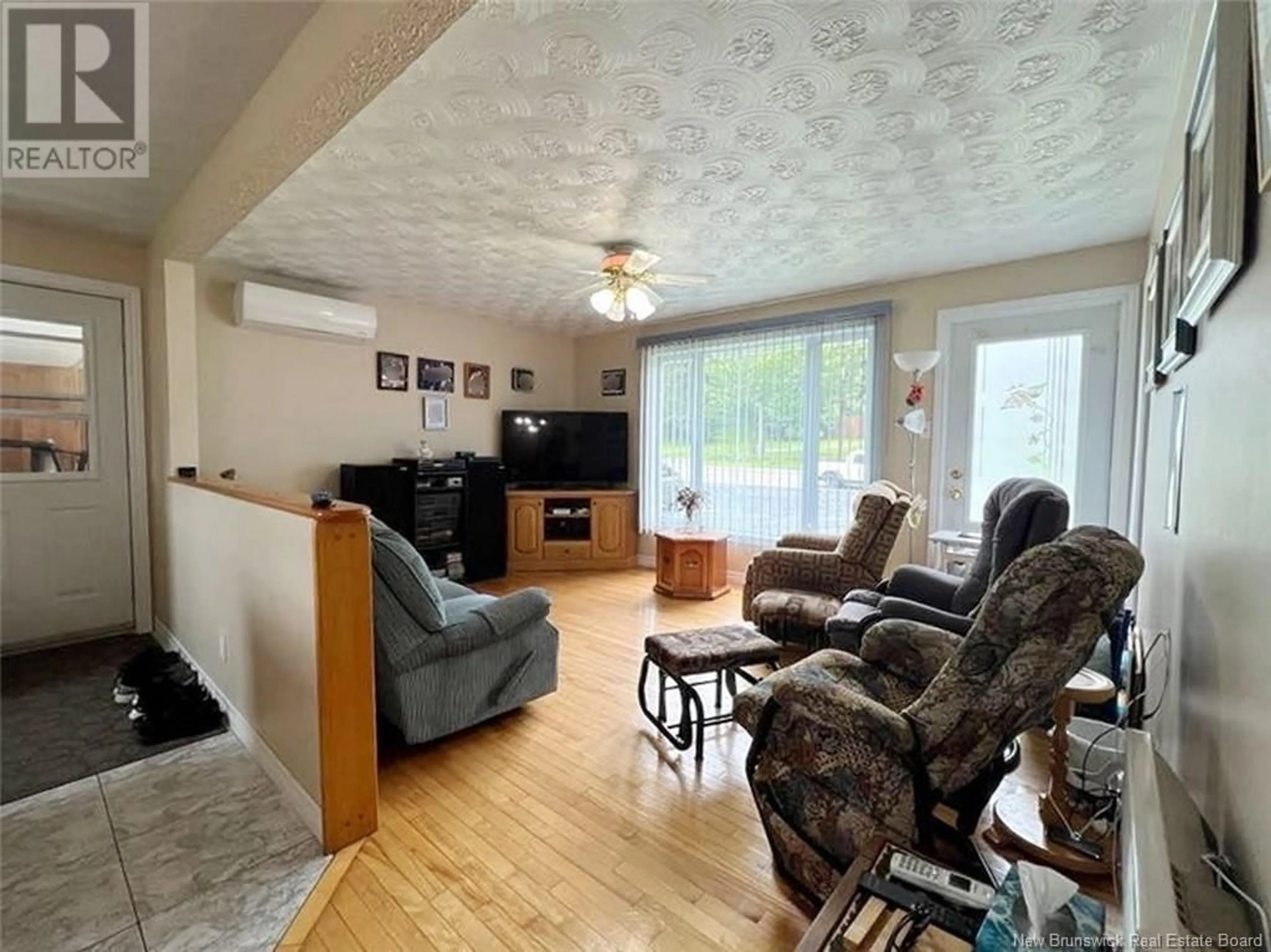 Living room with furniture, wood/laminate floor for 4597 ROUTE 120, Lac Baker New Brunswick E7A1M1