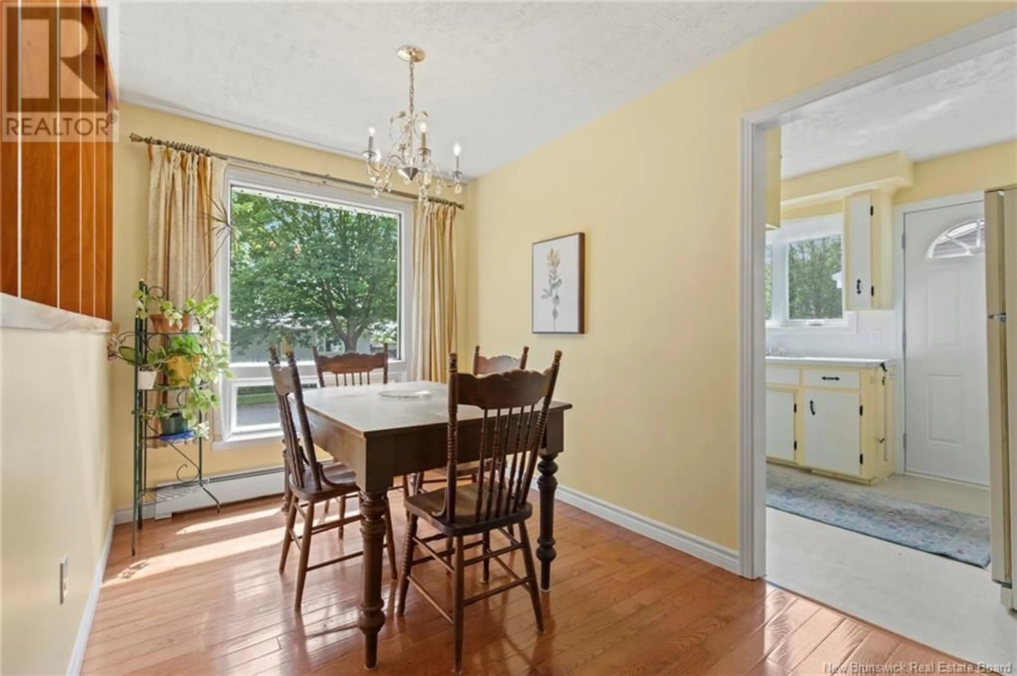 Dining room, wood/laminate floor for 596 BROAD STREET, Fredericton New Brunswick E3A2L8