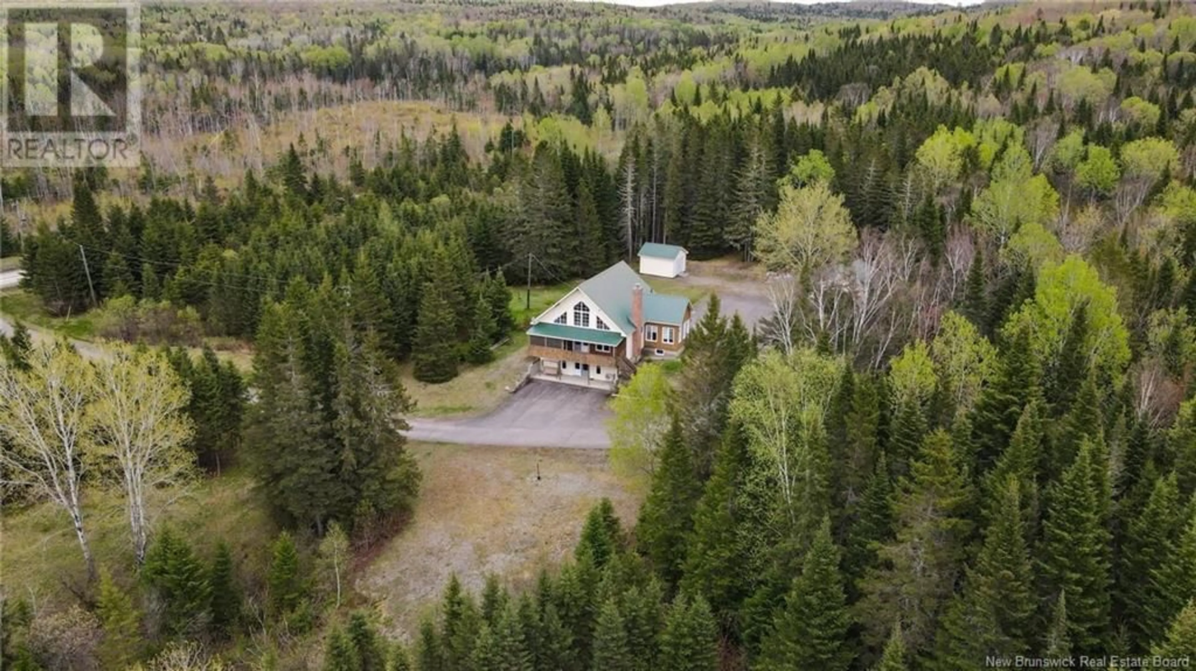 A pic from outside/outdoor area/front of a property/back of a property/a pic from drone, forest/trees view for 75 RICHARD ROAD, Baker Brook New Brunswick E7A1V5