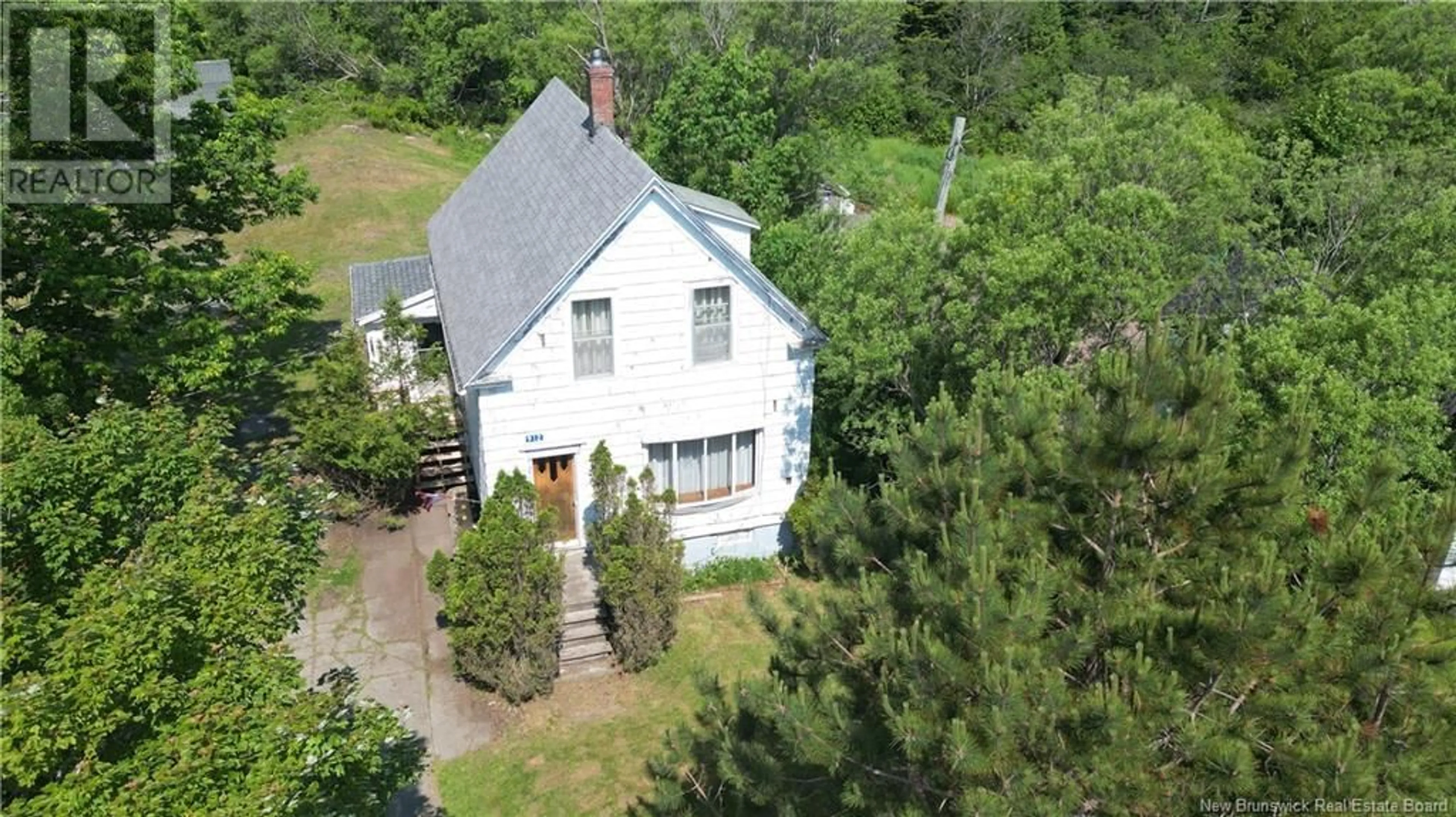 A pic from outside/outdoor area/front of a property/back of a property/a pic from drone, unknown for 912 ROUTE 776, Grand Manan New Brunswick E5G2E4