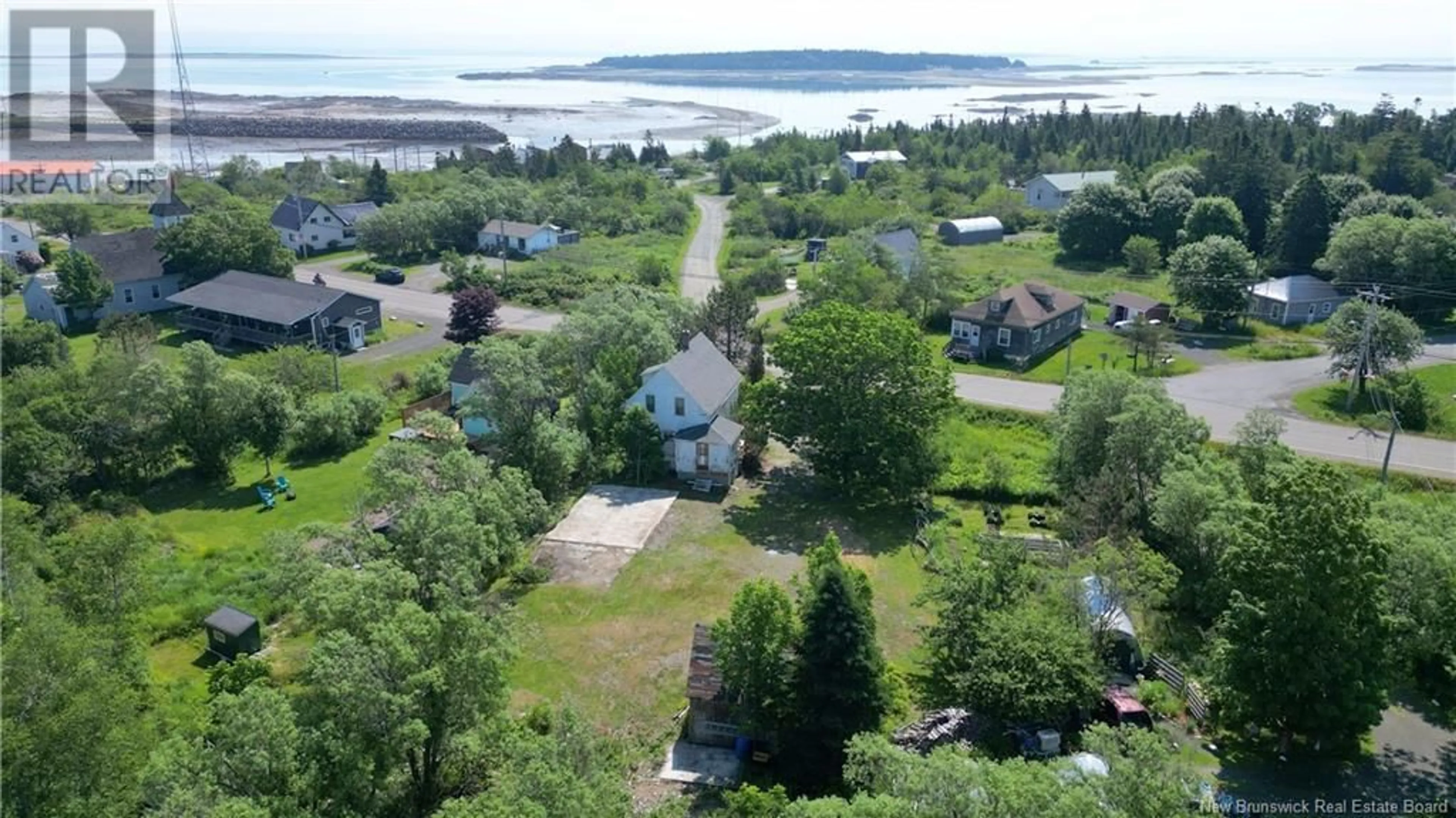 A pic from outside/outdoor area/front of a property/back of a property/a pic from drone, water/lake/river/ocean view for 912 ROUTE 776, Grand Manan New Brunswick E5G2E4