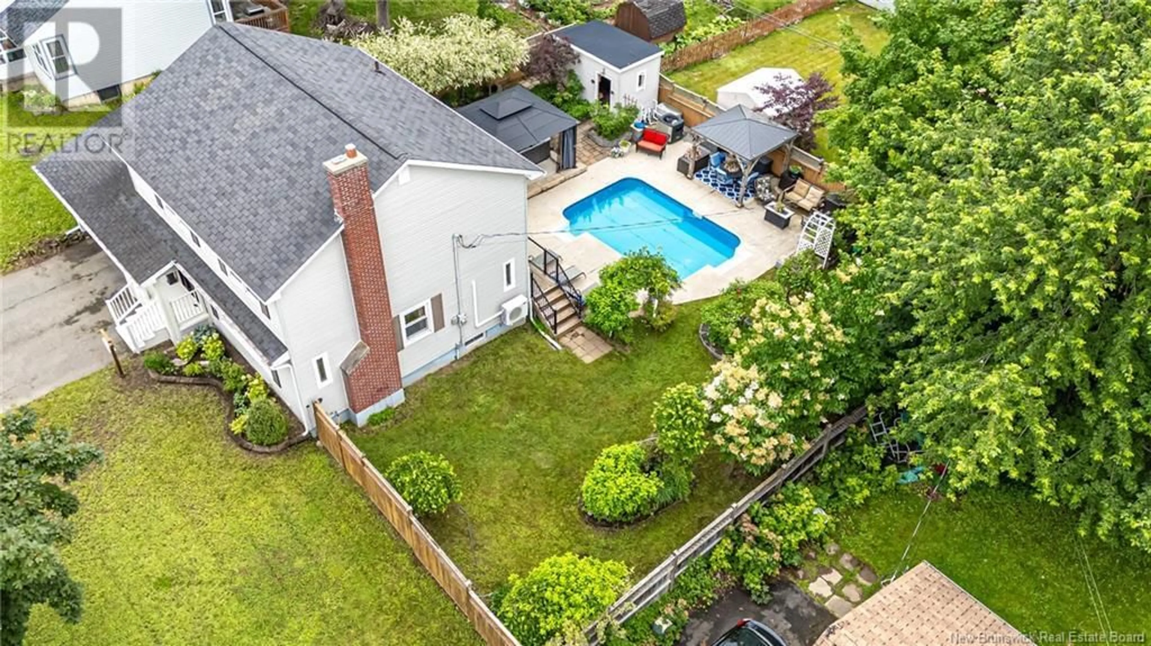 A pic from outside/outdoor area/front of a property/back of a property/a pic from drone, street for 204 WILLOW AVENUE, Fredericton New Brunswick E3A2E4