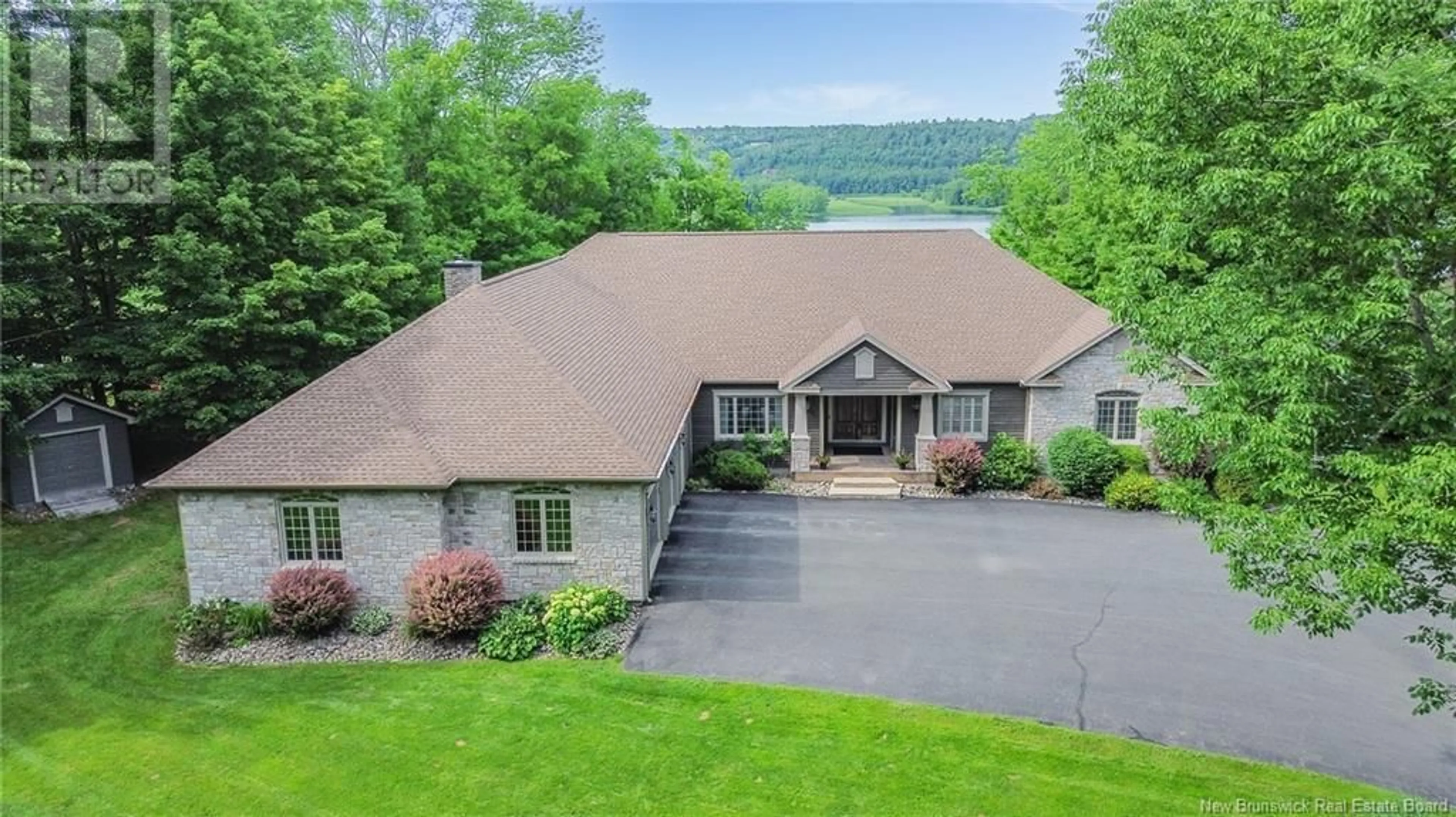 A pic from outside/outdoor area/front of a property/back of a property/a pic from drone, water/lake/river/ocean view for 2885 WOODSTOCK ROAD, Fredericton New Brunswick E3C1R1