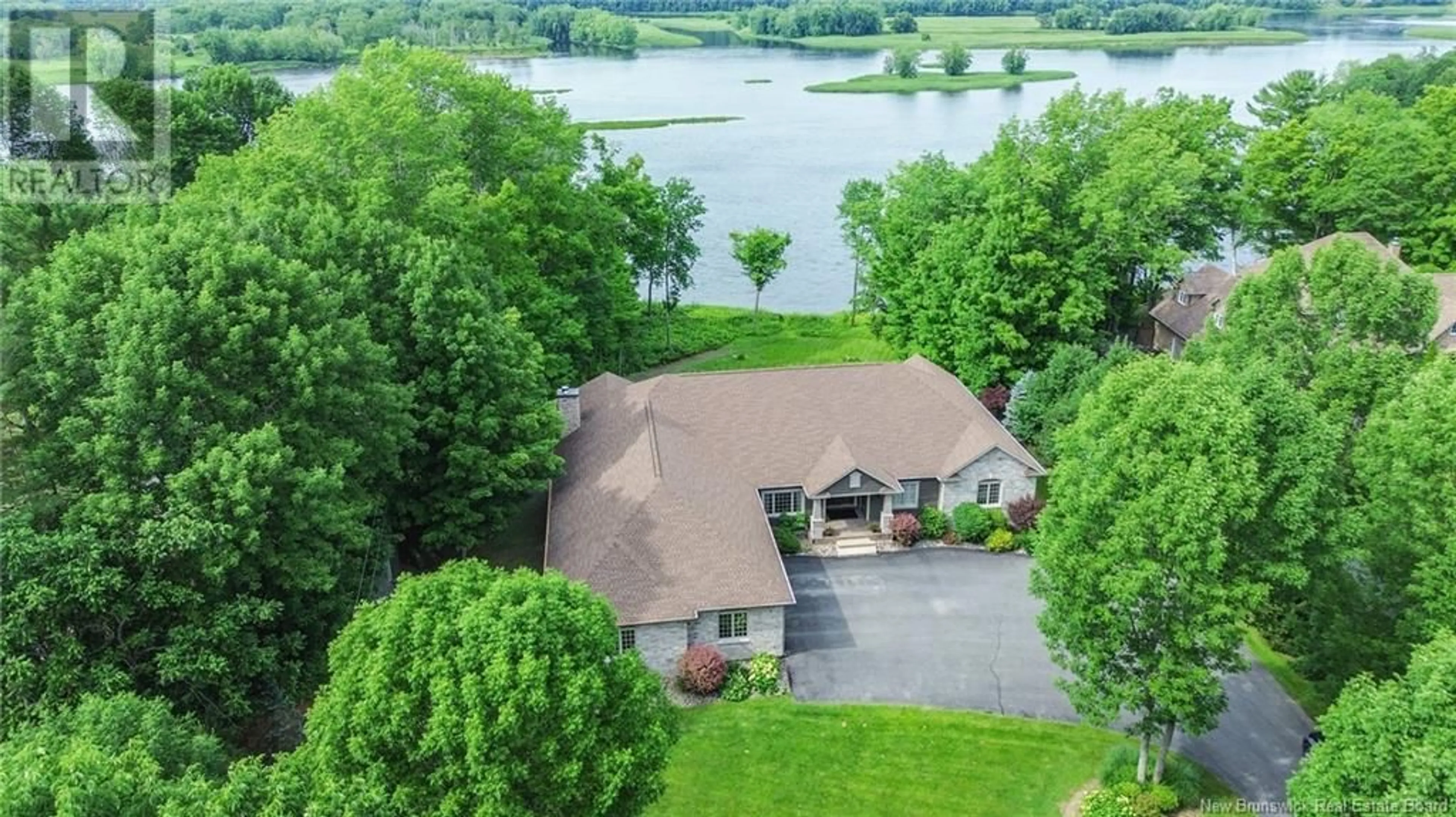 A pic from outside/outdoor area/front of a property/back of a property/a pic from drone, water/lake/river/ocean view for 2885 WOODSTOCK ROAD, Fredericton New Brunswick E3C1R1