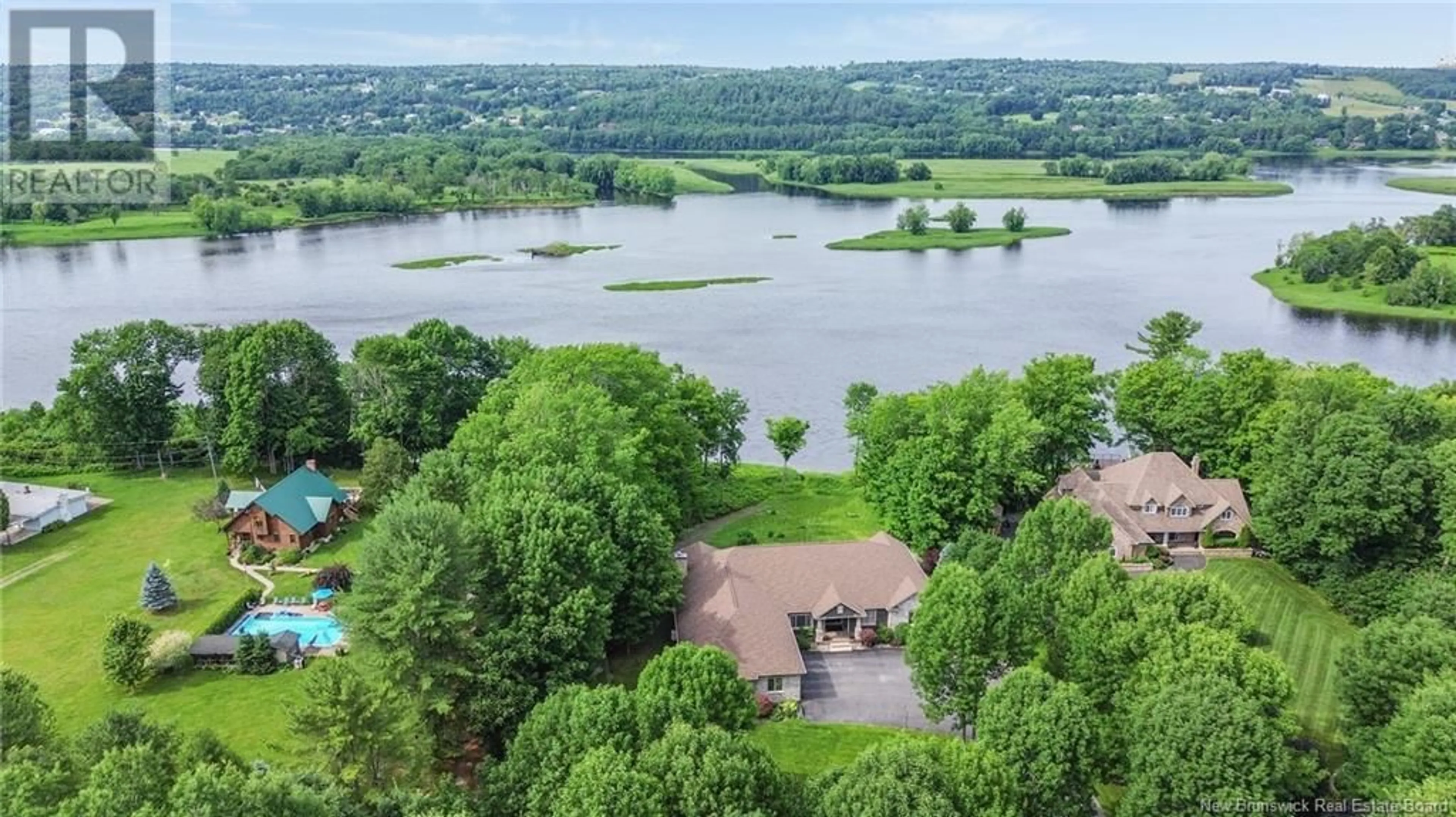 A pic from outside/outdoor area/front of a property/back of a property/a pic from drone, water/lake/river/ocean view for 2885 WOODSTOCK ROAD, Fredericton New Brunswick E3C1R1