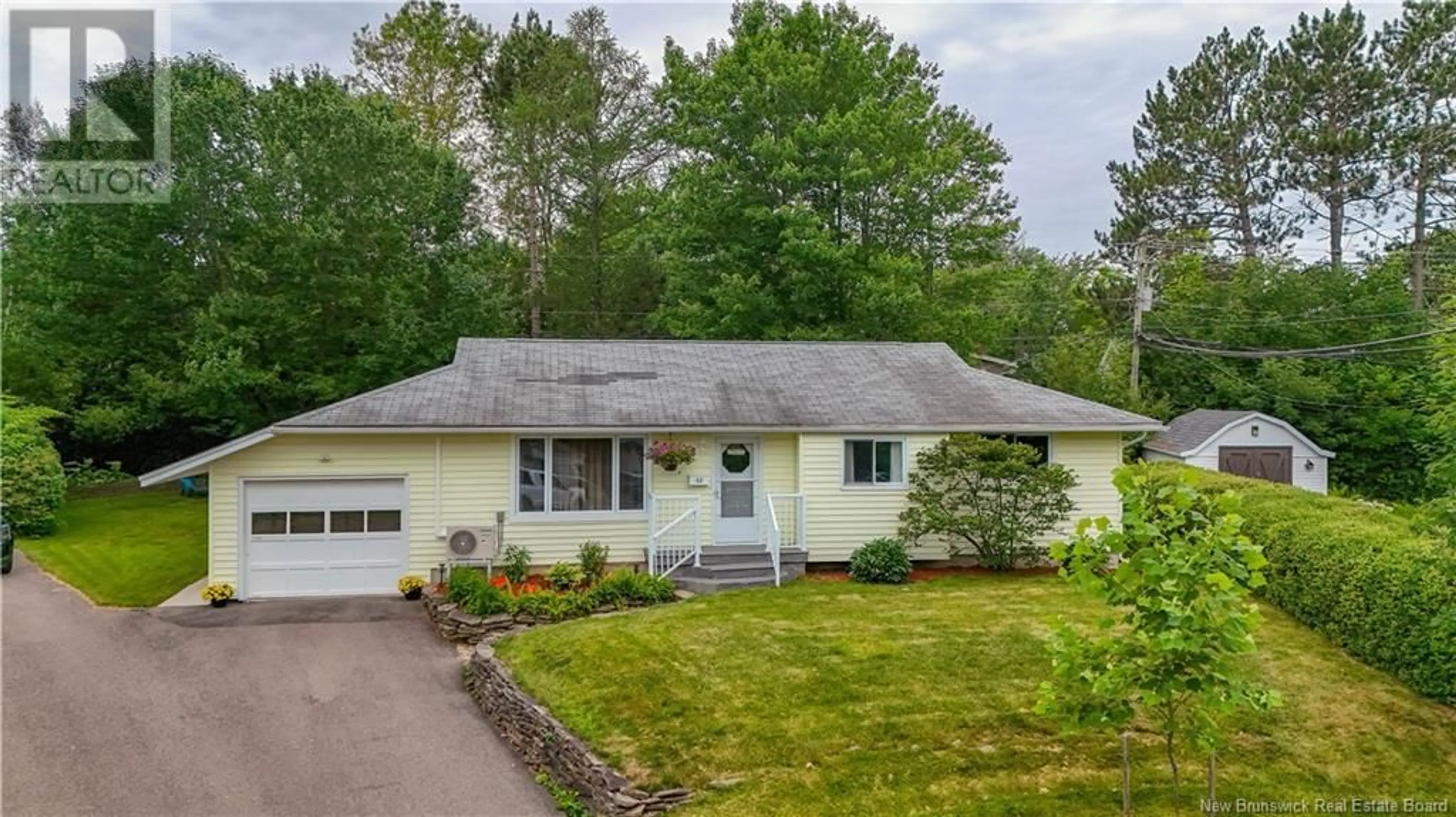 Home with vinyl exterior material, street for 68 MANCHESTER COURT, Fredericton New Brunswick E3B4P2