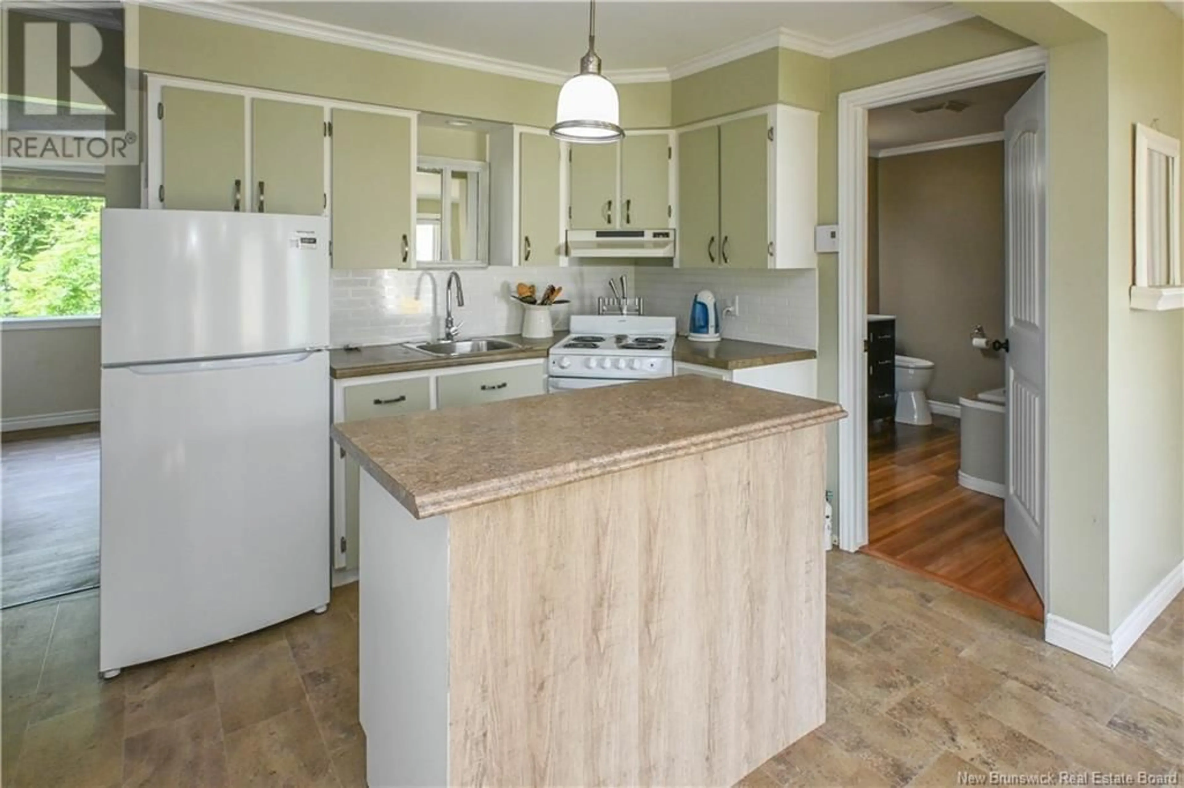 Standard kitchen, wood/laminate floor for 5 DES BUISSONS LANE, Bertrand New Brunswick E1W0E2