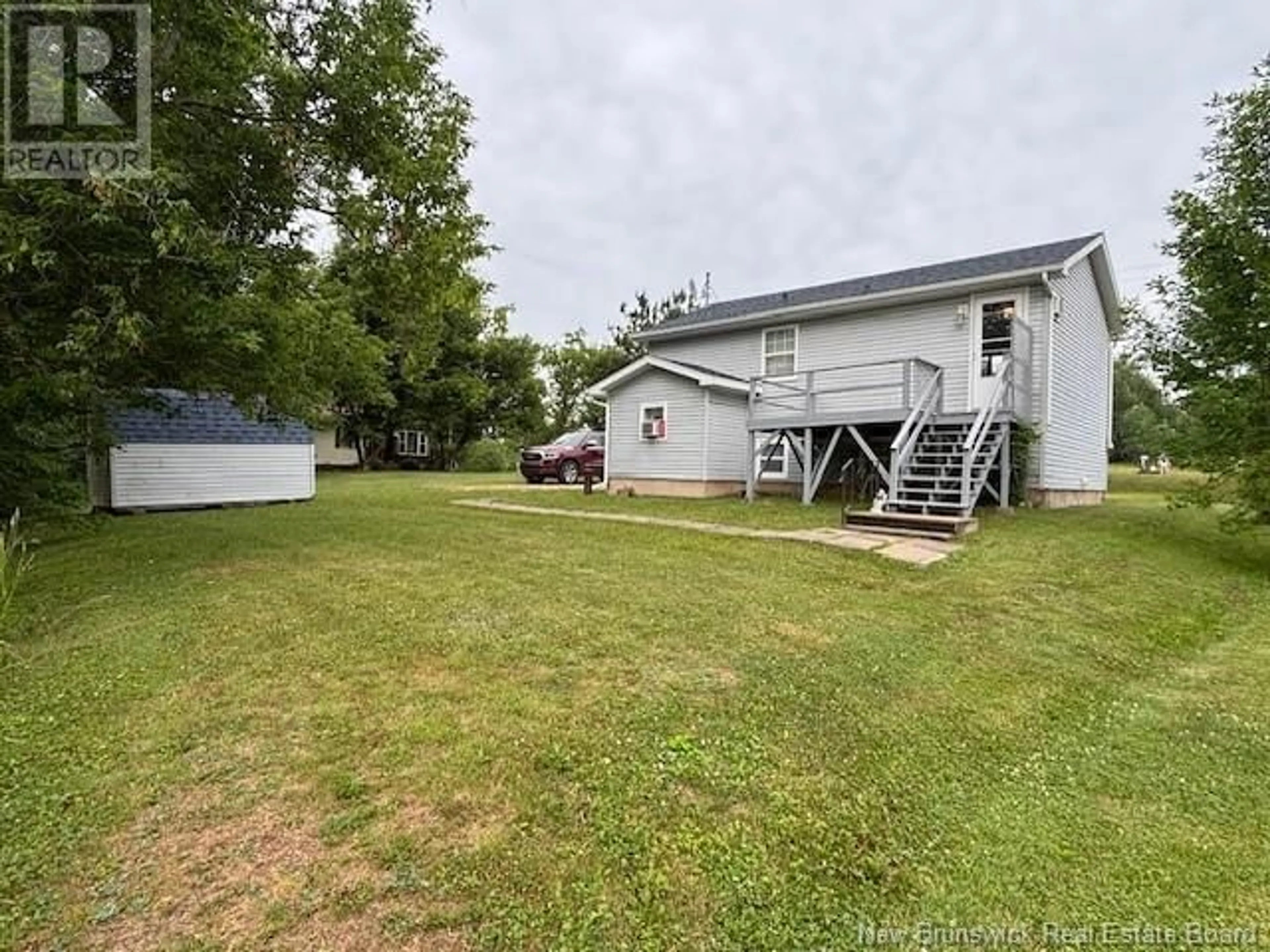 A pic from outside/outdoor area/front of a property/back of a property/a pic from drone, water/lake/river/ocean view for 10 SMITH STREET, Petitcodiac New Brunswick E4Z4W1
