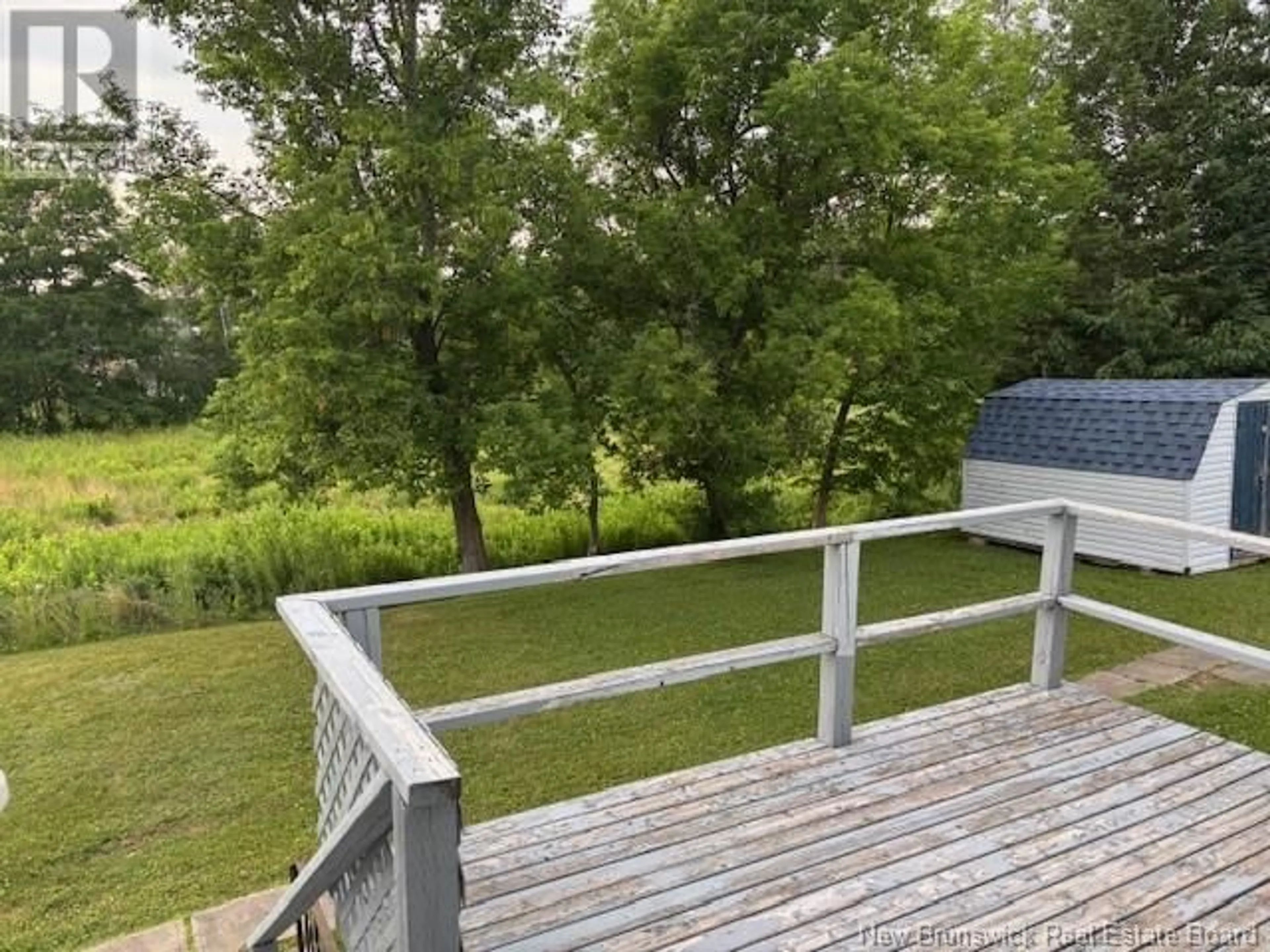 A pic from outside/outdoor area/front of a property/back of a property/a pic from drone, water/lake/river/ocean view for 10 SMITH STREET, Petitcodiac New Brunswick E4Z4W1