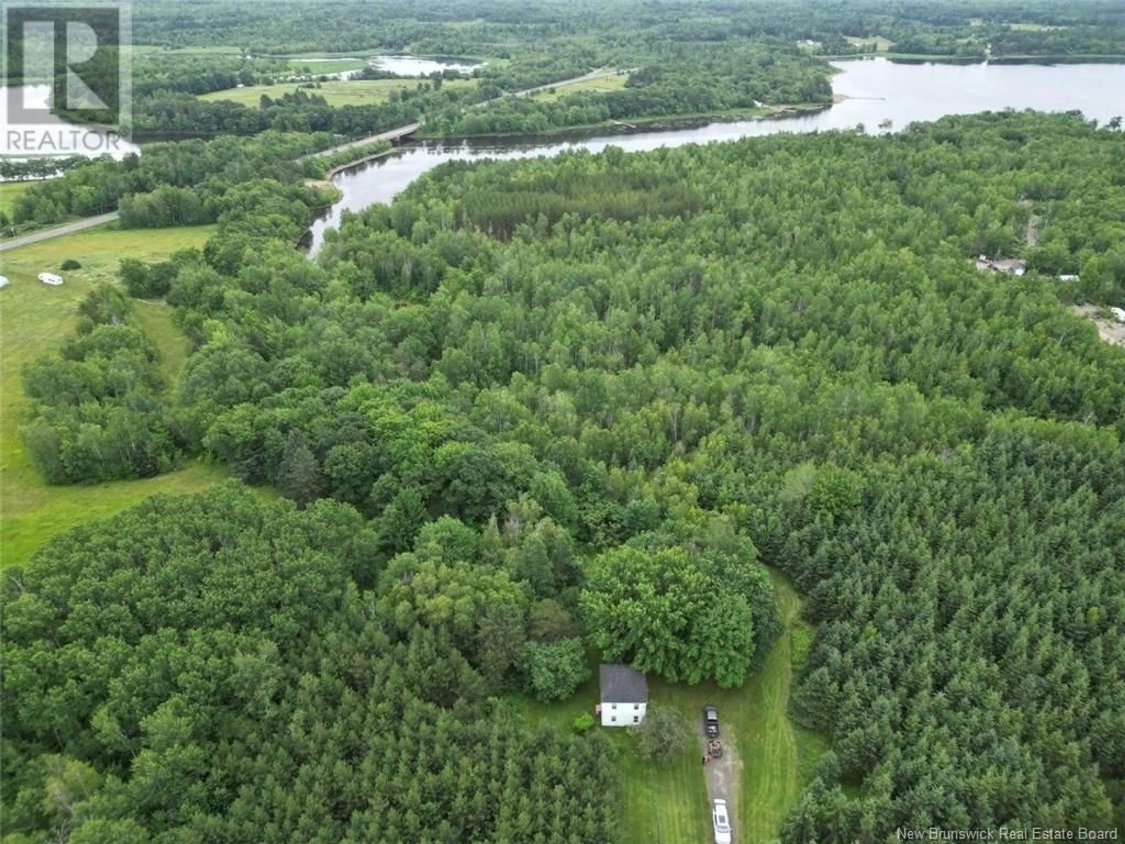 A pic from outside/outdoor area/front of a property/back of a property/a pic from drone, forest/trees view for 39 SALMON RIVER MOUTH ROAD, Coal Creek New Brunswick E4A2T2