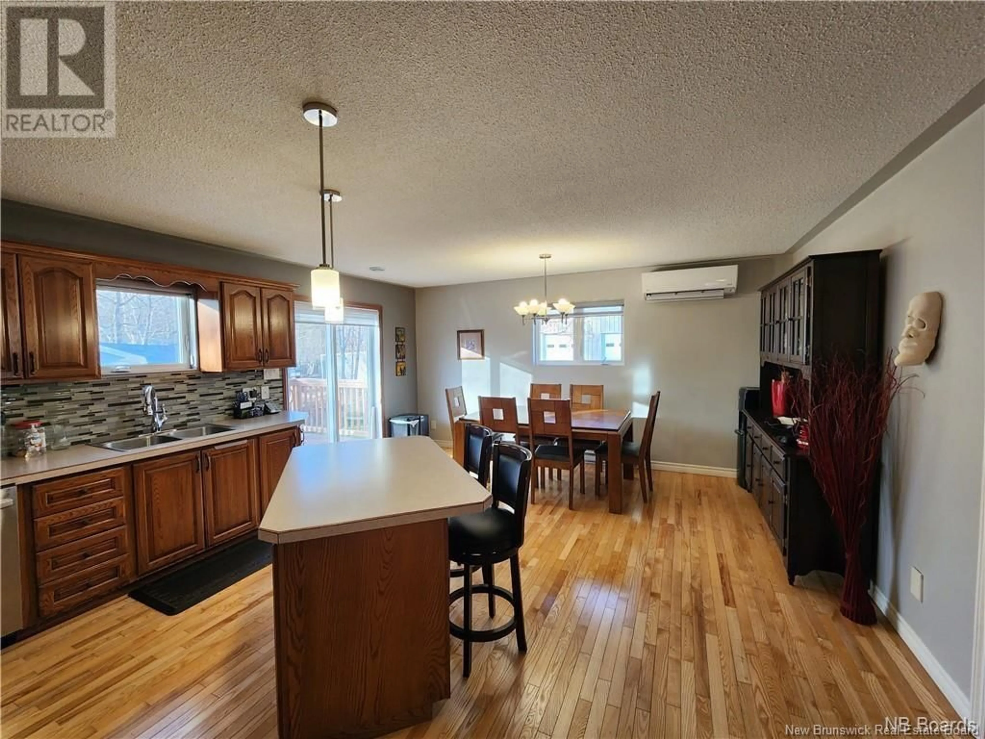 Open concept kitchen, wood/laminate floor for 229 JACQUELINE DRIVE, Miramichi New Brunswick E1N3Z2