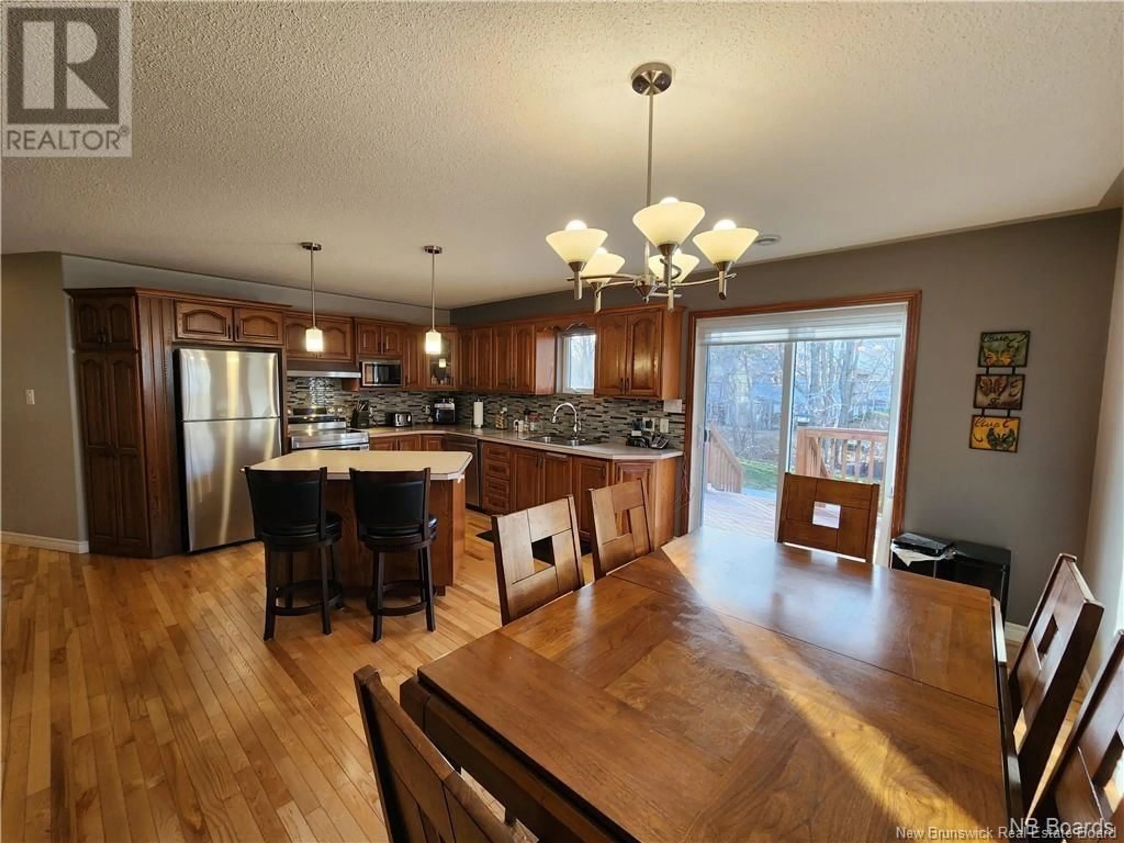 Open concept kitchen, wood/laminate floor for 229 JACQUELINE DRIVE, Miramichi New Brunswick E1N3Z2