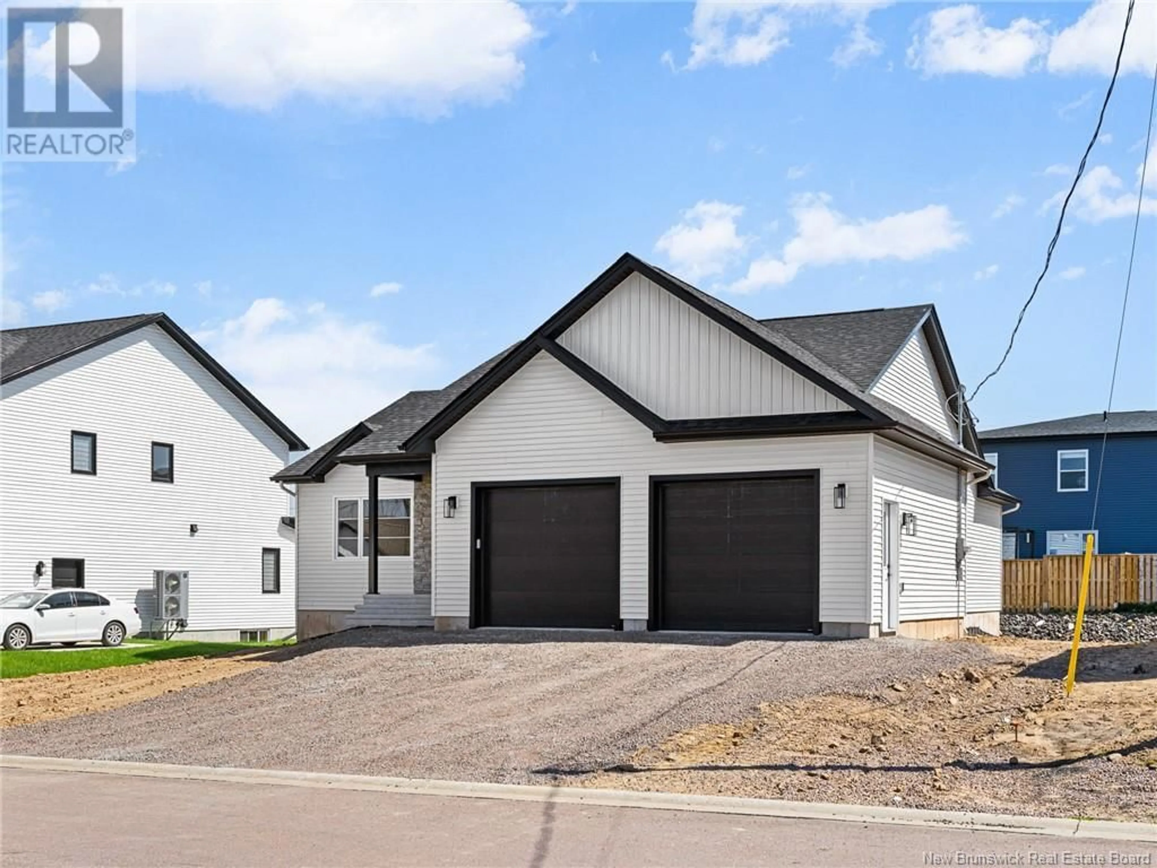 Home with vinyl exterior material, street for 18 MARC COURT, Shediac New Brunswick E4P0E9