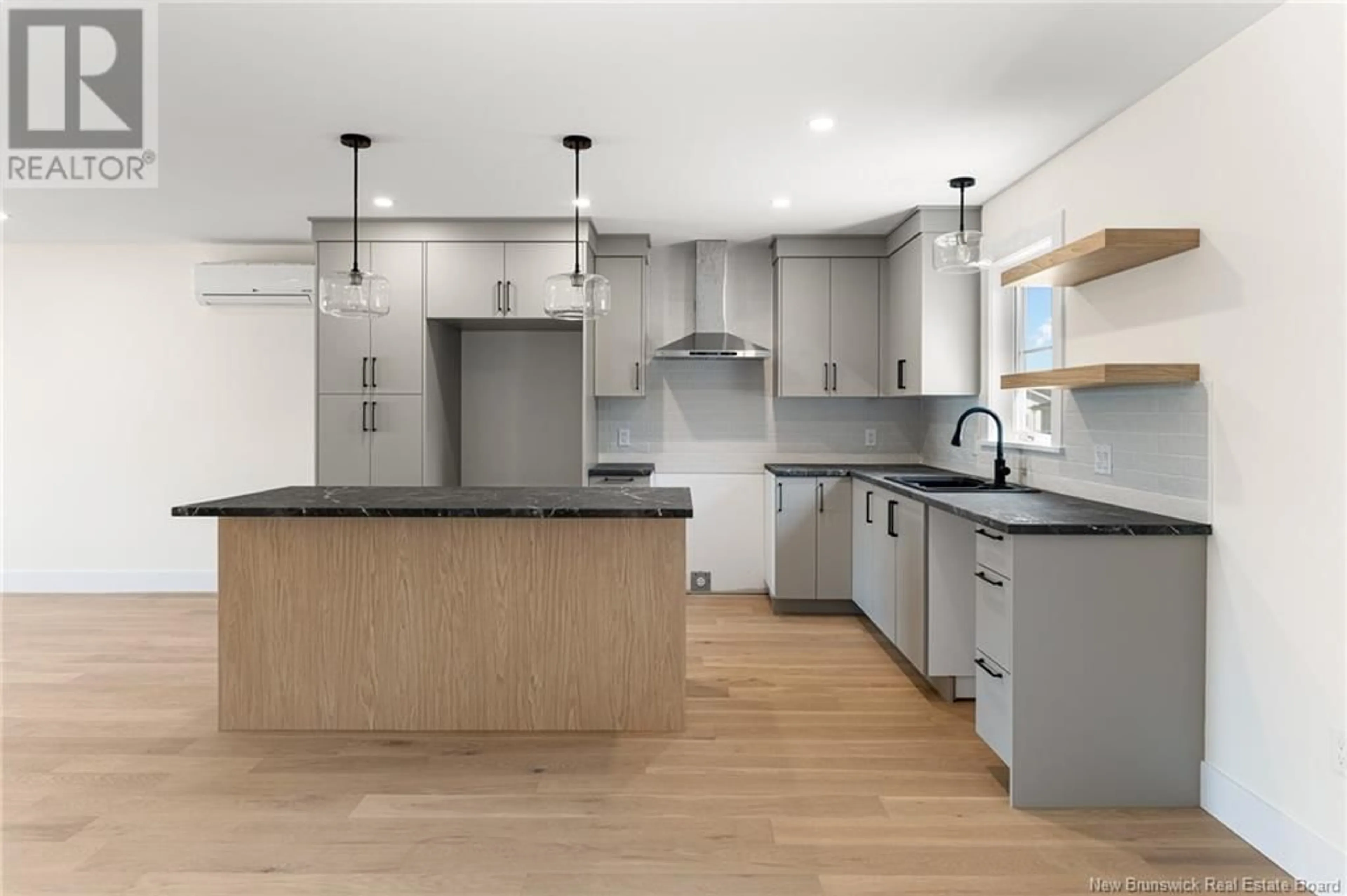 Open concept kitchen, unknown for 18 MARC COURT, Shediac New Brunswick E4P0E9