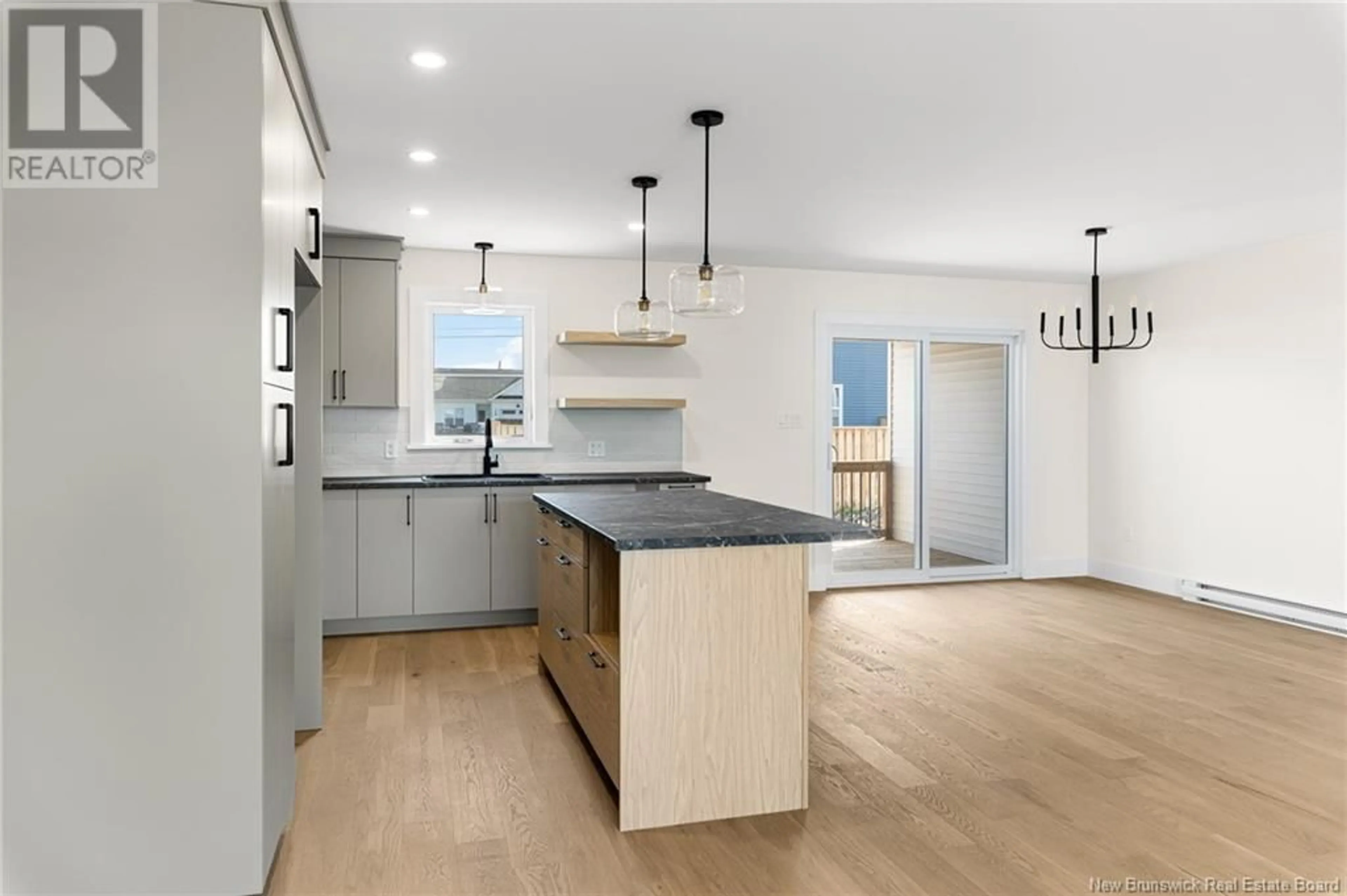 Open concept kitchen, unknown for 18 MARC COURT, Shediac New Brunswick E4P0E9