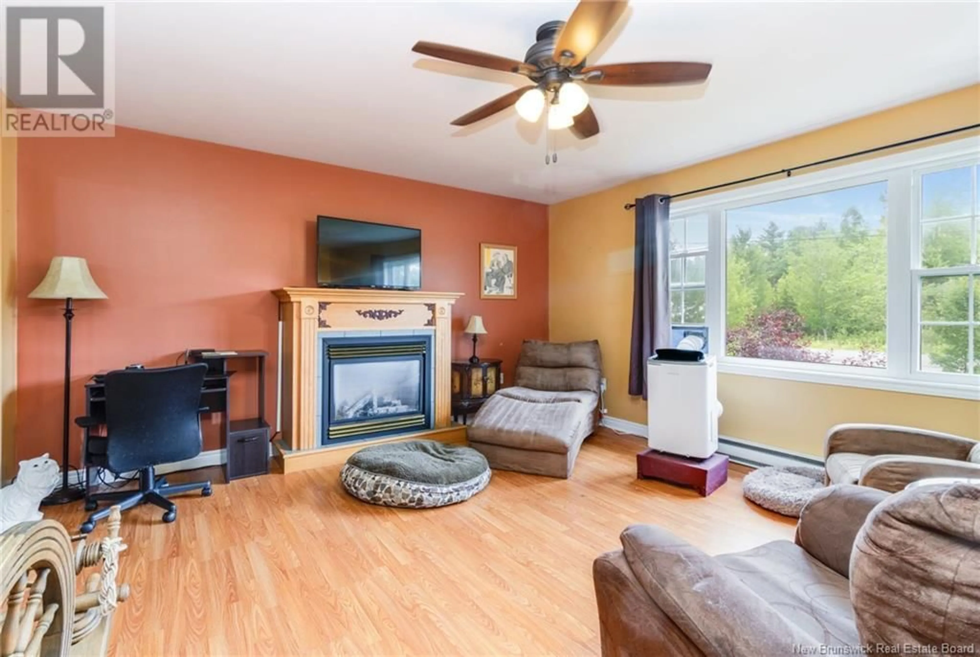 Living room with furniture, wood/laminate floor for 27 DOREAN STREET, Waterville-Sunbury New Brunswick E2V3V7