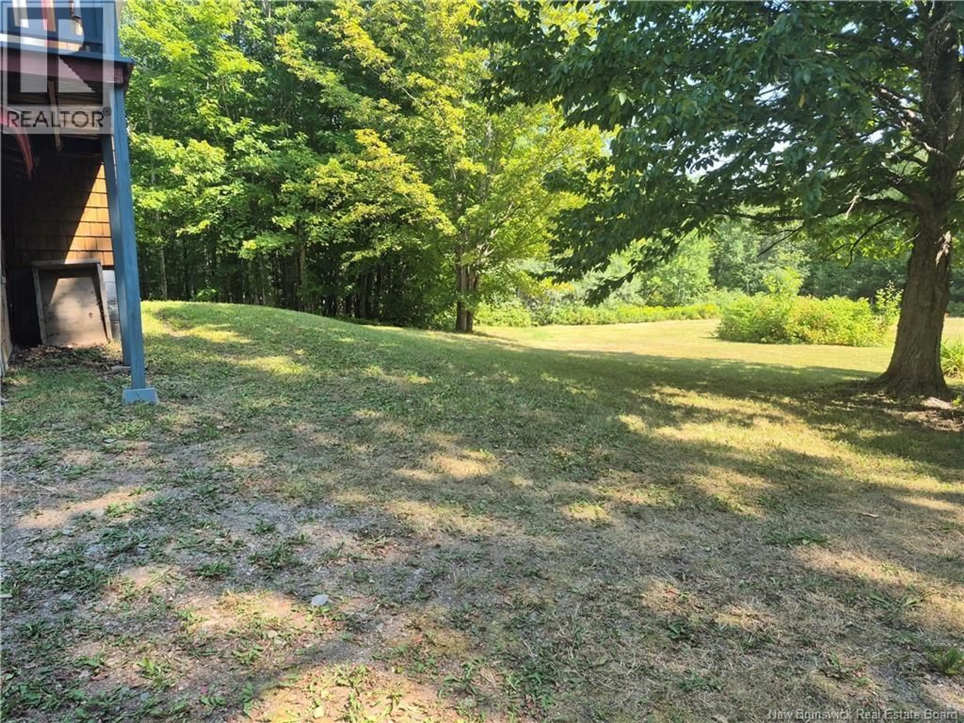 A pic from outside/outdoor area/front of a property/back of a property/a pic from drone, forest/trees view for 1893 CH LUGAR, Lugar New Brunswick E8K3B6