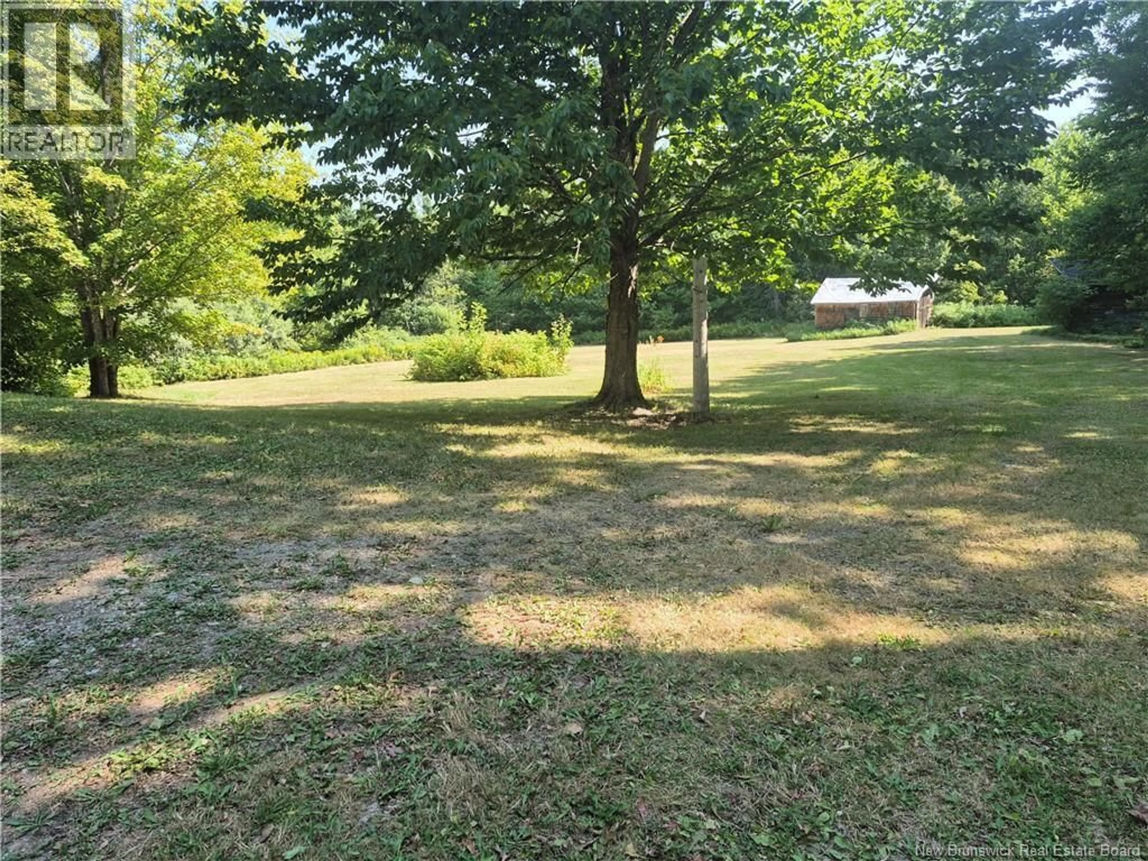 A pic from outside/outdoor area/front of a property/back of a property/a pic from drone, forest/trees view for 1893 CH LUGAR, Lugar New Brunswick E8K3B6