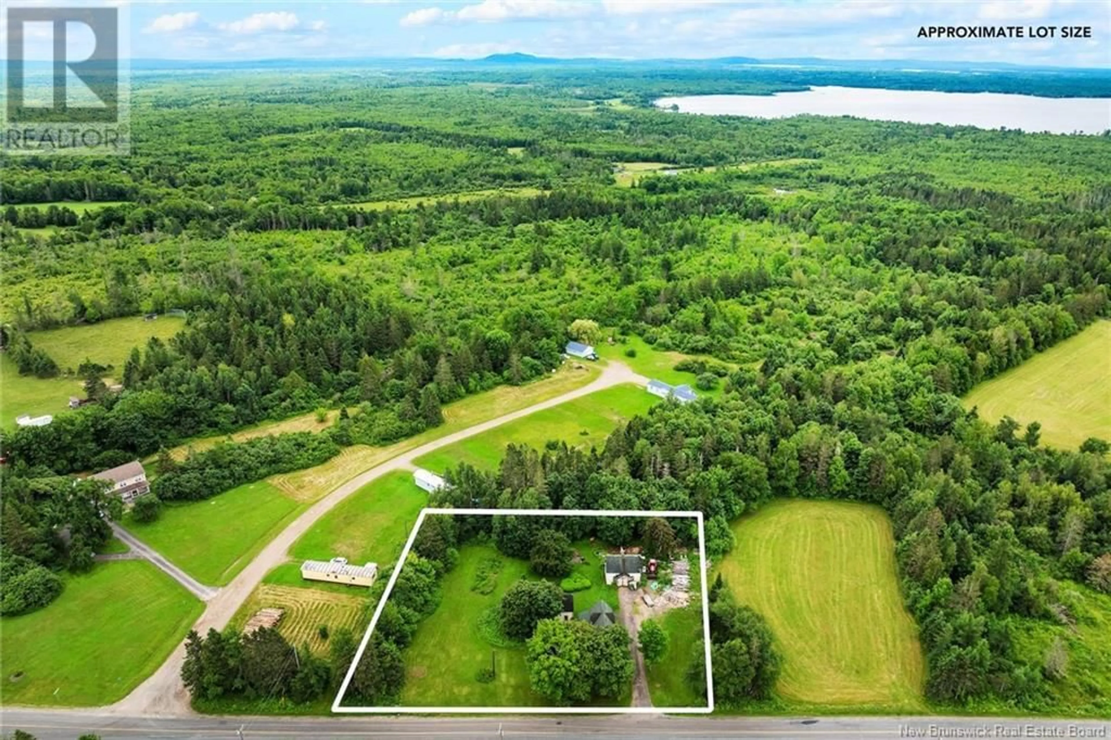 A pic from outside/outdoor area/front of a property/back of a property/a pic from drone, water/lake/river/ocean view for 605 635 ROUTE, Lake George New Brunswick E6K3M3