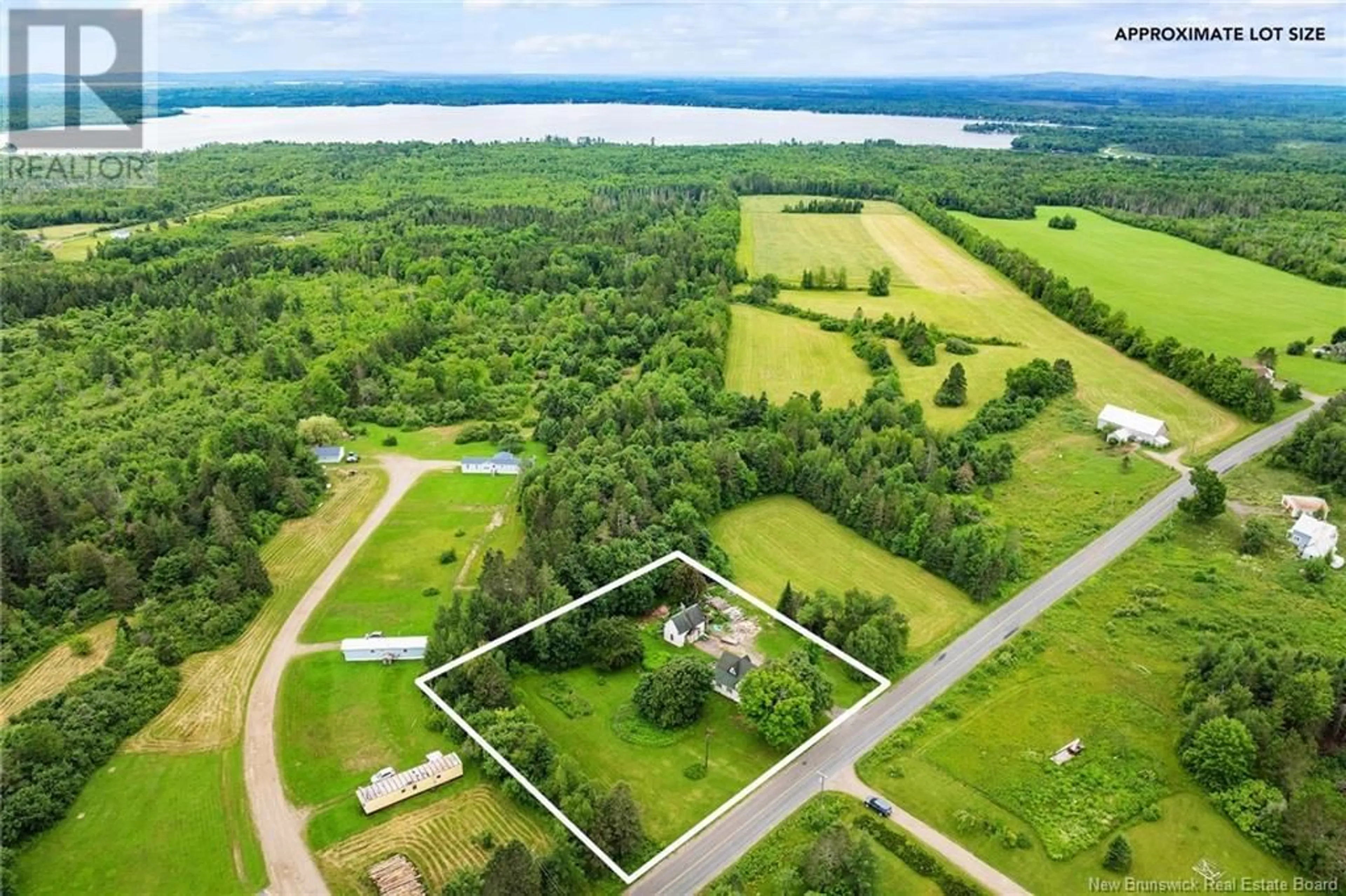 A pic from outside/outdoor area/front of a property/back of a property/a pic from drone, water/lake/river/ocean view for 605 635 ROUTE, Lake George New Brunswick E6K3M3