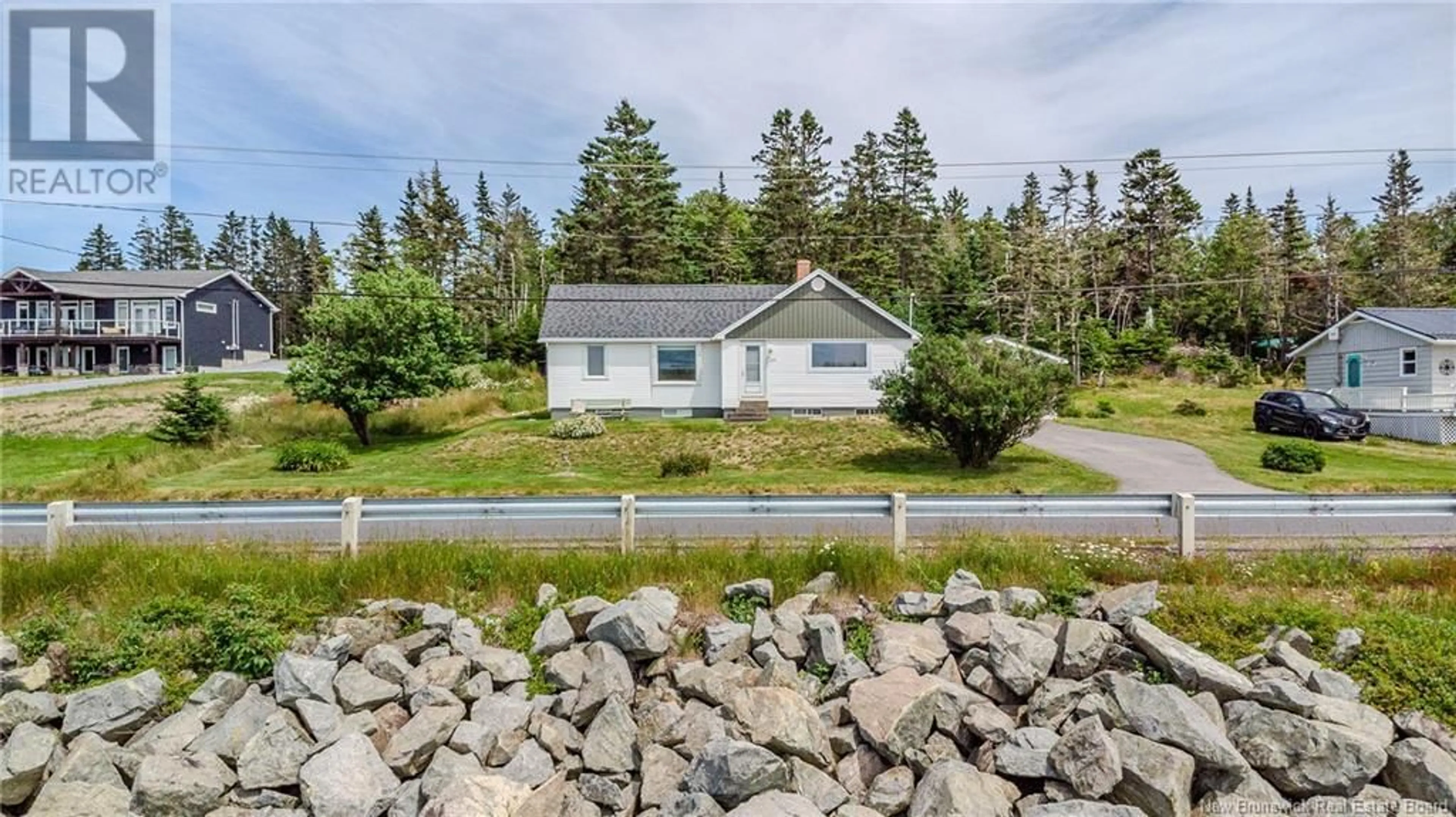 A pic from outside/outdoor area/front of a property/back of a property/a pic from drone, water/lake/river/ocean view for 375 MACES BAY ROAD, Maces Bay New Brunswick E5J1T1