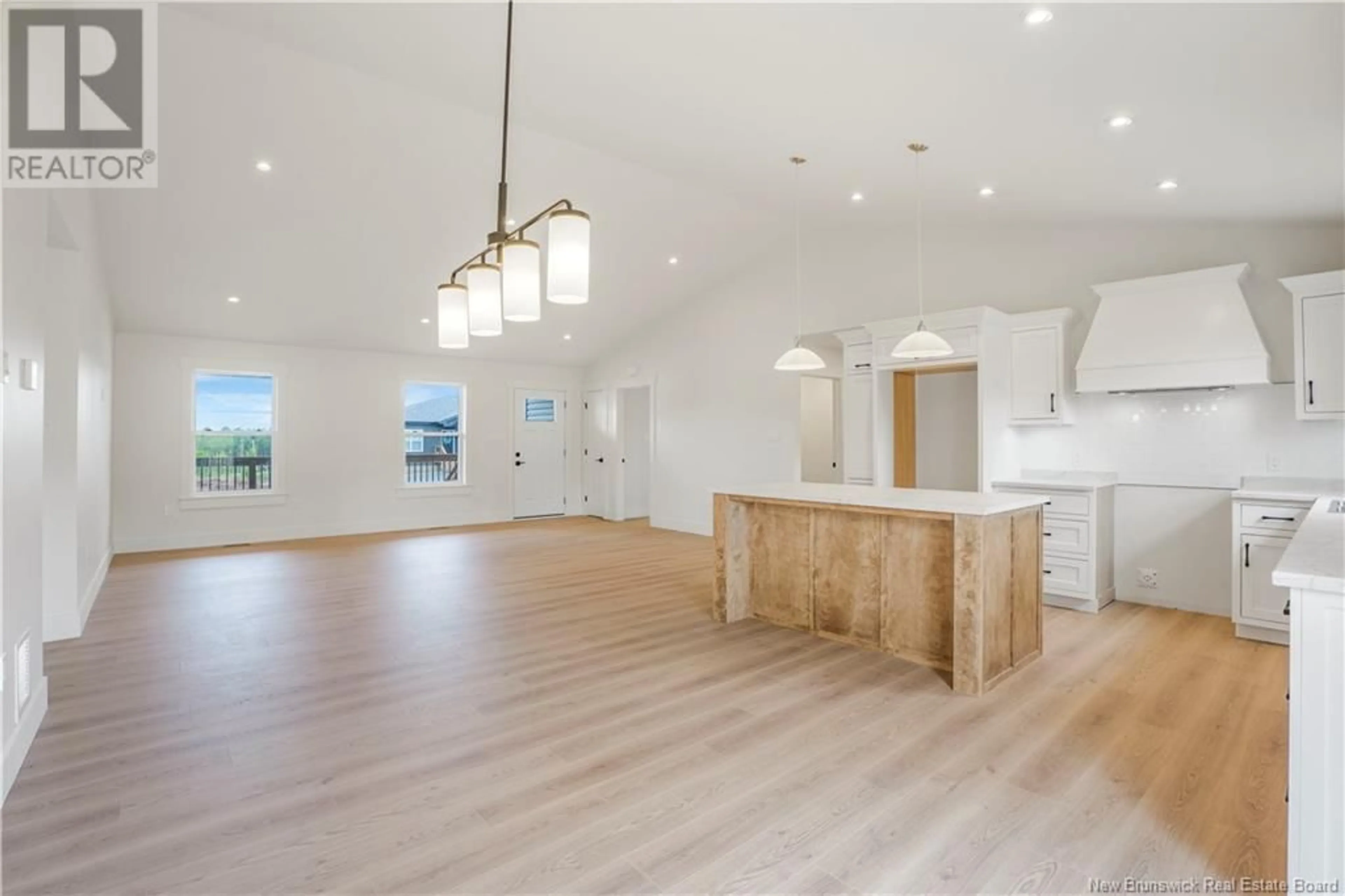 Open concept kitchen, wood/laminate floor for 116 GLENNORTH STREET, Fredericton New Brunswick E3G0A3