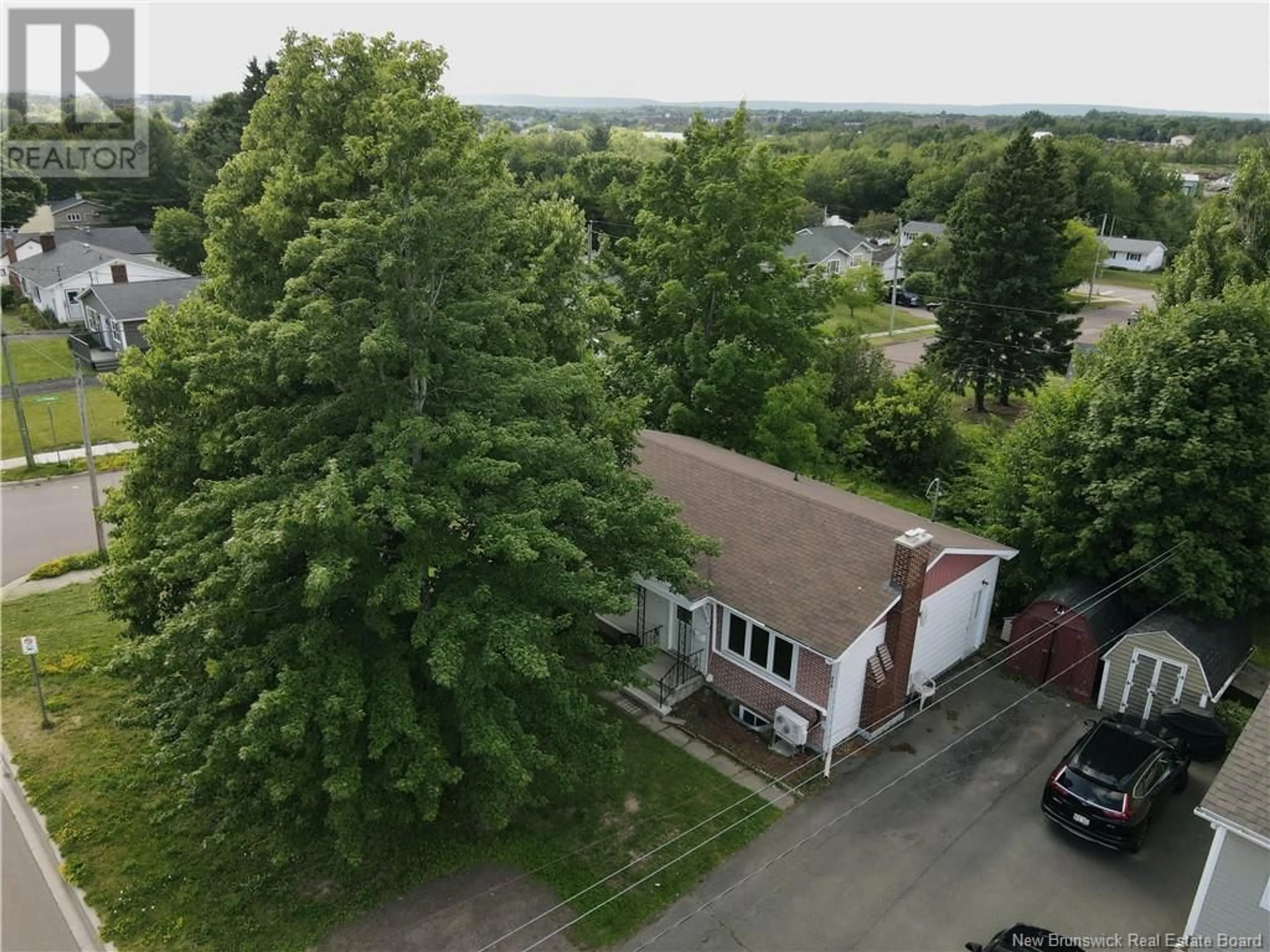 A pic from outside/outdoor area/front of a property/back of a property/a pic from drone, unknown for 118 DRUMMOND STREET, Moncton New Brunswick E1A2Z4