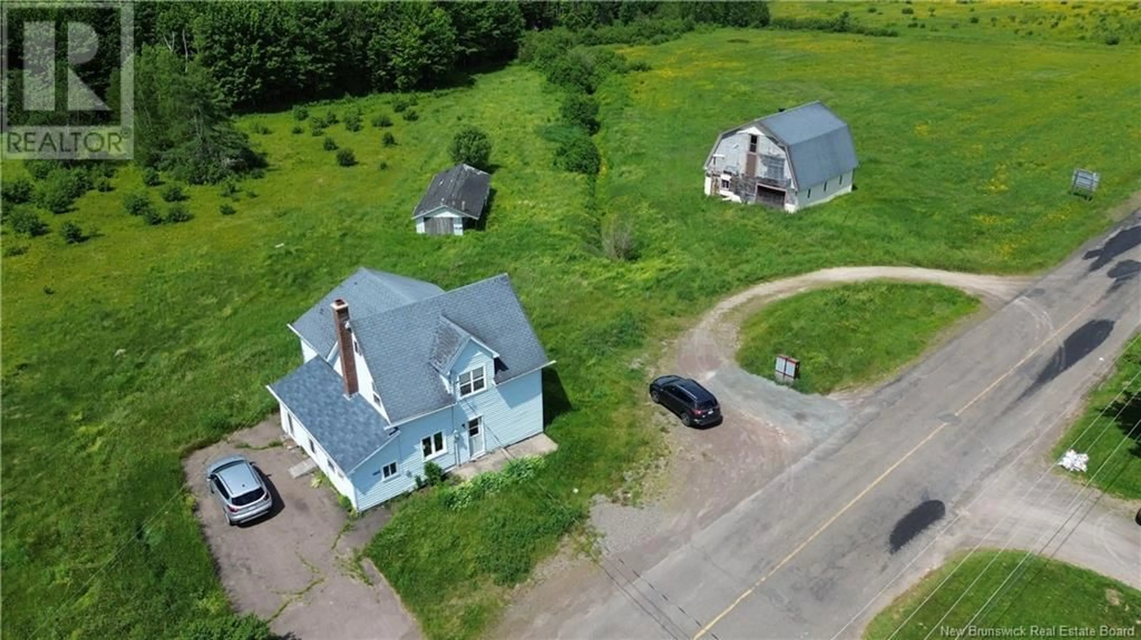 A pic from outside/outdoor area/front of a property/back of a property/a pic from drone, street for 5106 ROUTE 495, Sainte-Marie-De-Kent New Brunswick E4S1Z8