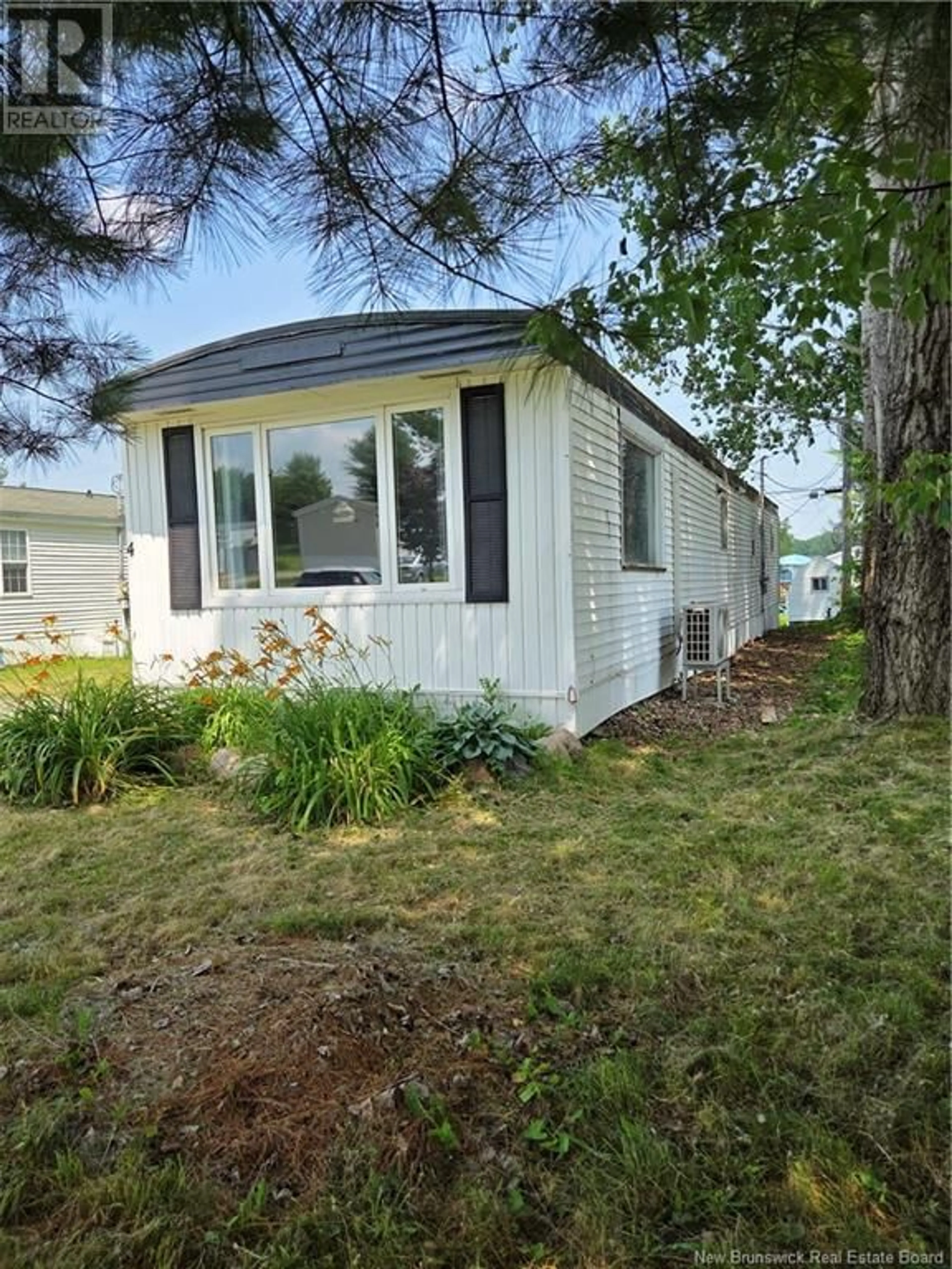 Home with vinyl exterior material, street for 4 LESLEE DRIVE, Lincoln New Brunswick E3B6W4