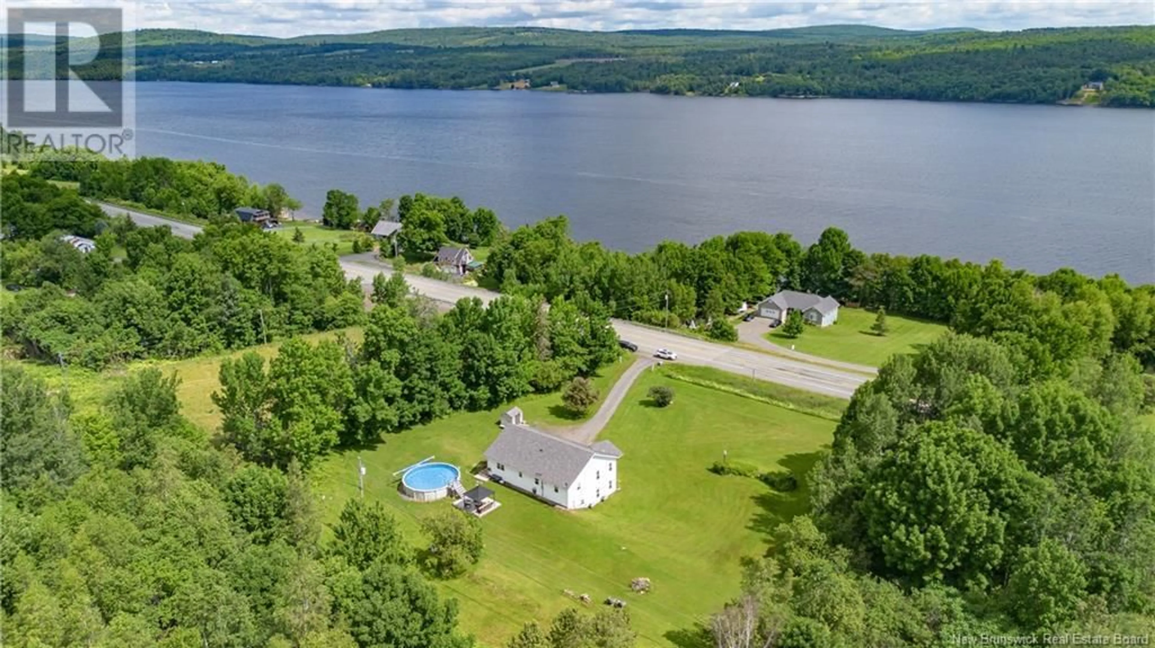 A pic from outside/outdoor area/front of a property/back of a property/a pic from drone, water/lake/river/ocean view for 7332 102 ROUTE, Dumfries New Brunswick E6G1P8