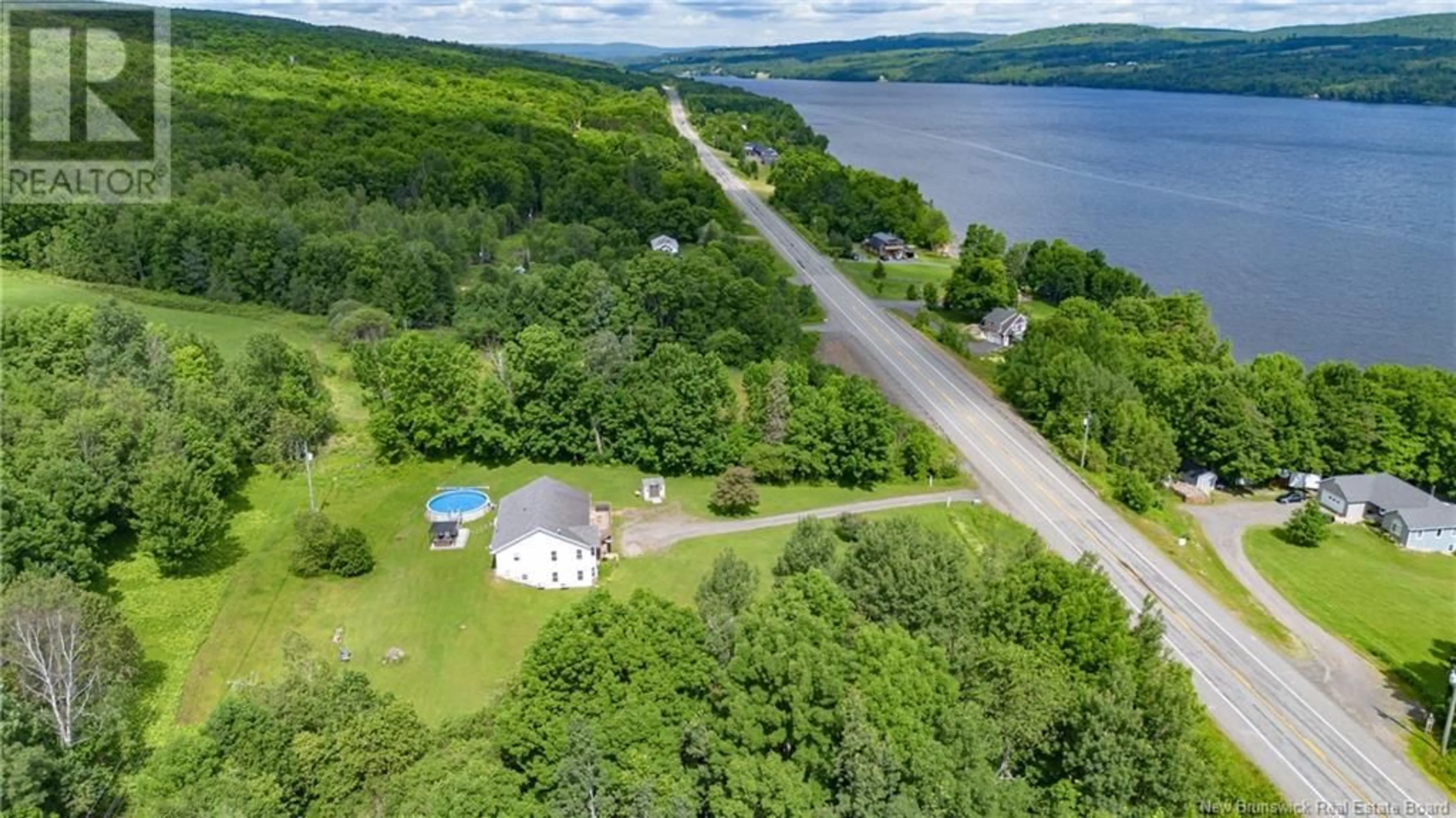 A pic from outside/outdoor area/front of a property/back of a property/a pic from drone, water/lake/river/ocean view for 7332 102 ROUTE, Dumfries New Brunswick E6G1P8