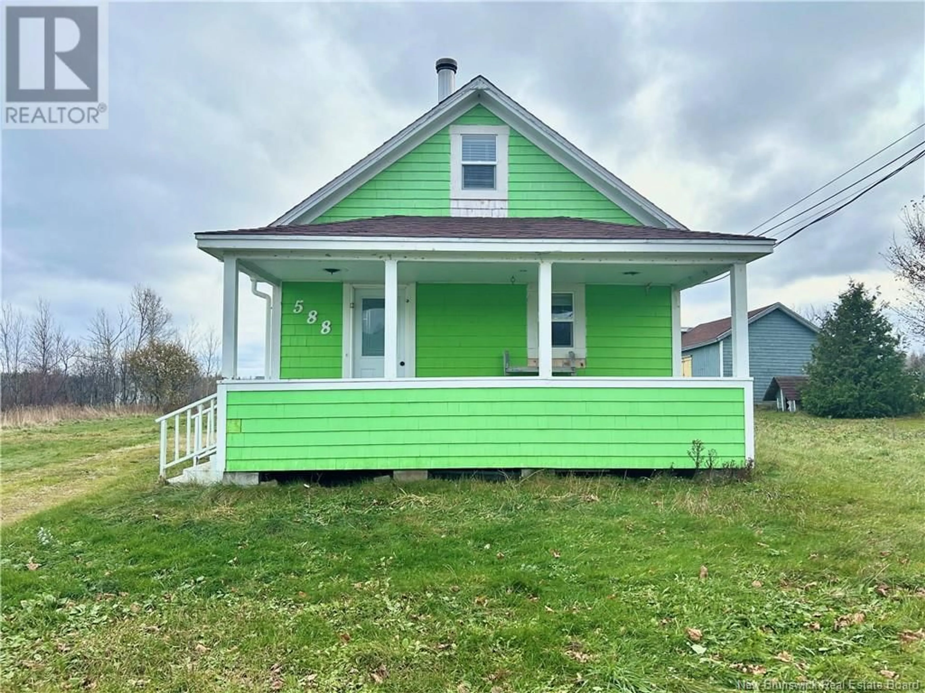 Home with vinyl exterior material, street for 588 STE-ANNE STREET, Caraquet New Brunswick E1W1A2