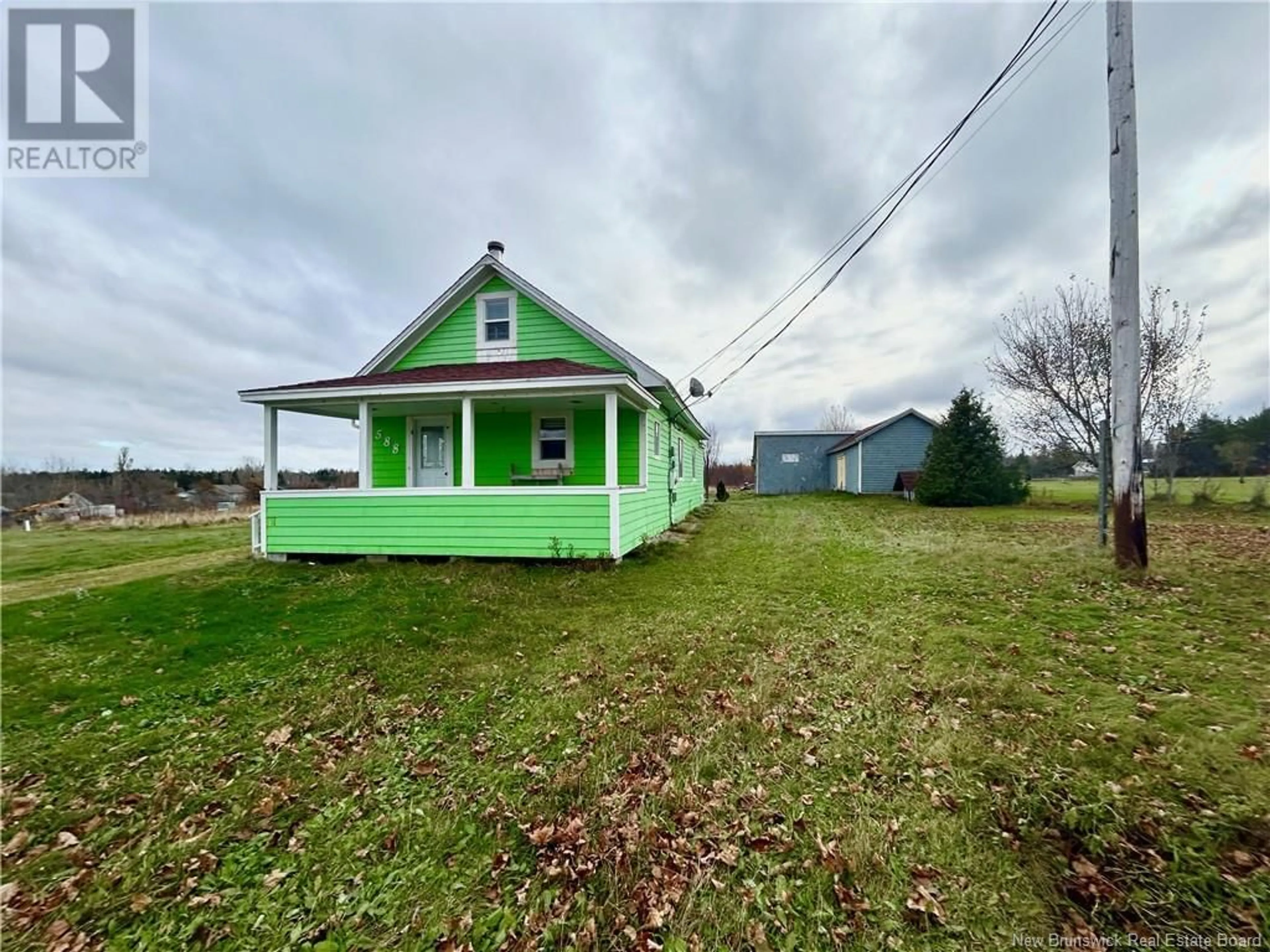 A pic from outside/outdoor area/front of a property/back of a property/a pic from drone, building for 588 STE-ANNE STREET, Caraquet New Brunswick E1W1A2